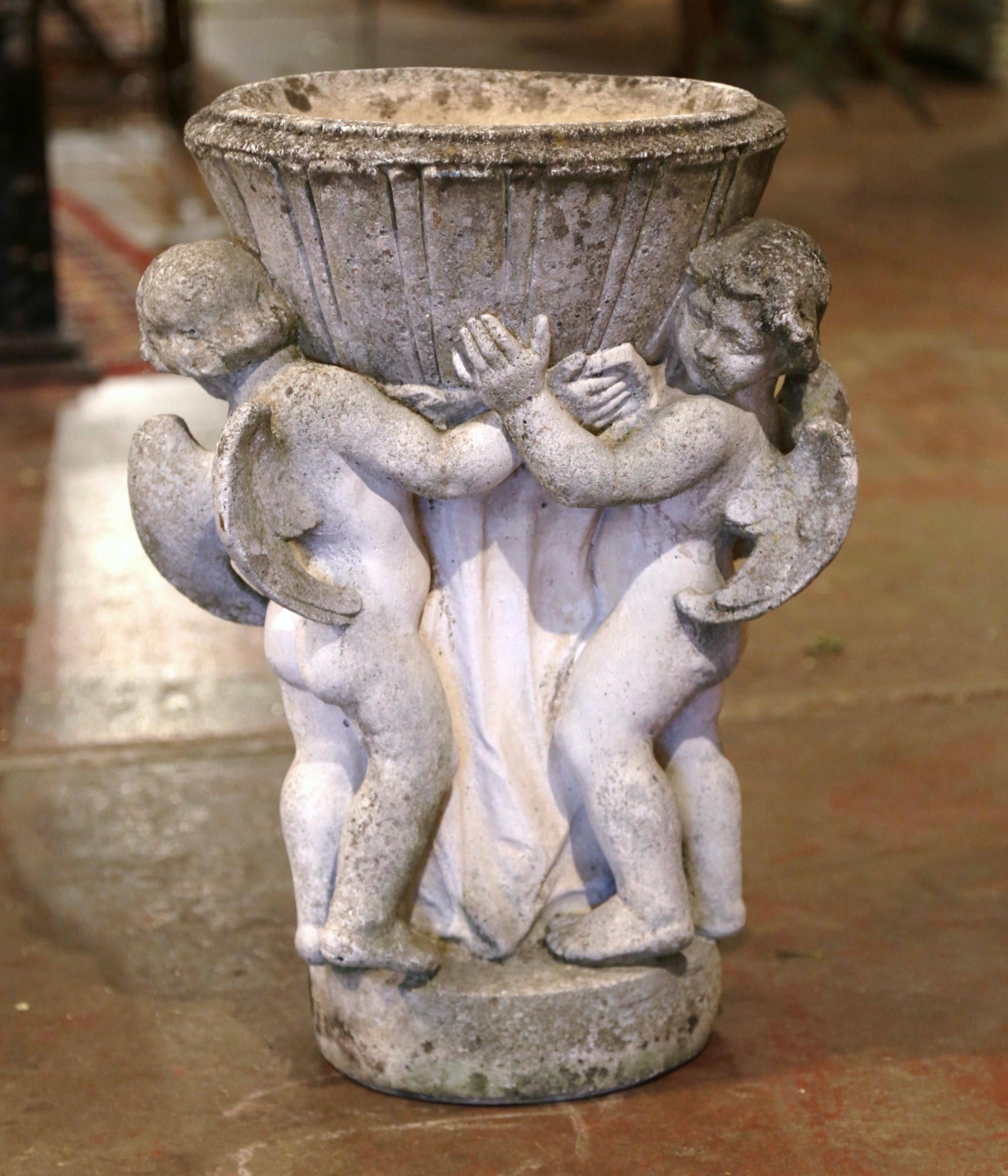 Cast Stone 19th Century French Carved Patinated and Weathered Stone Planter with Cherubs