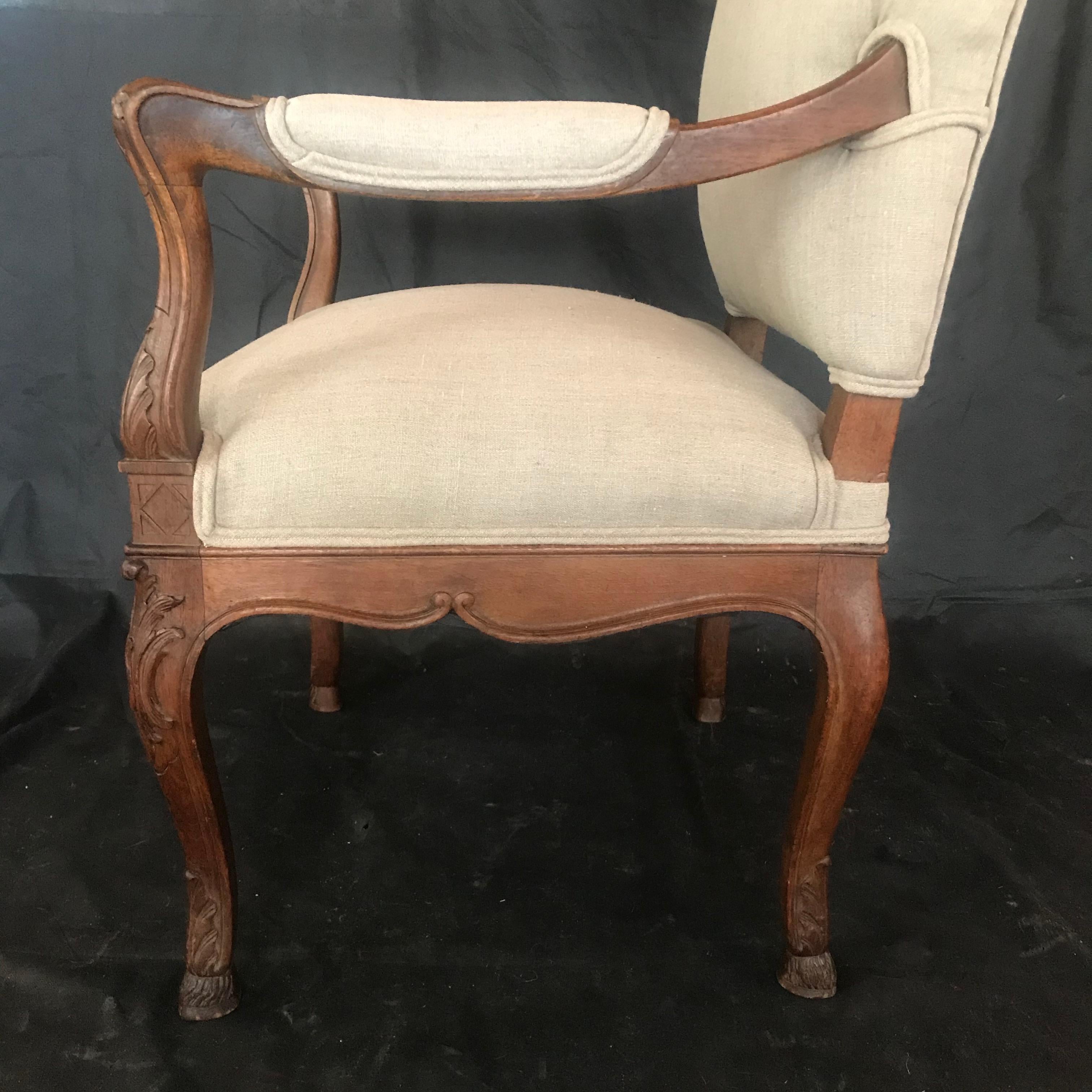 Upholstery 19th Century French Carved Regency Style Walnut Chair with Scrolled Arms For Sale