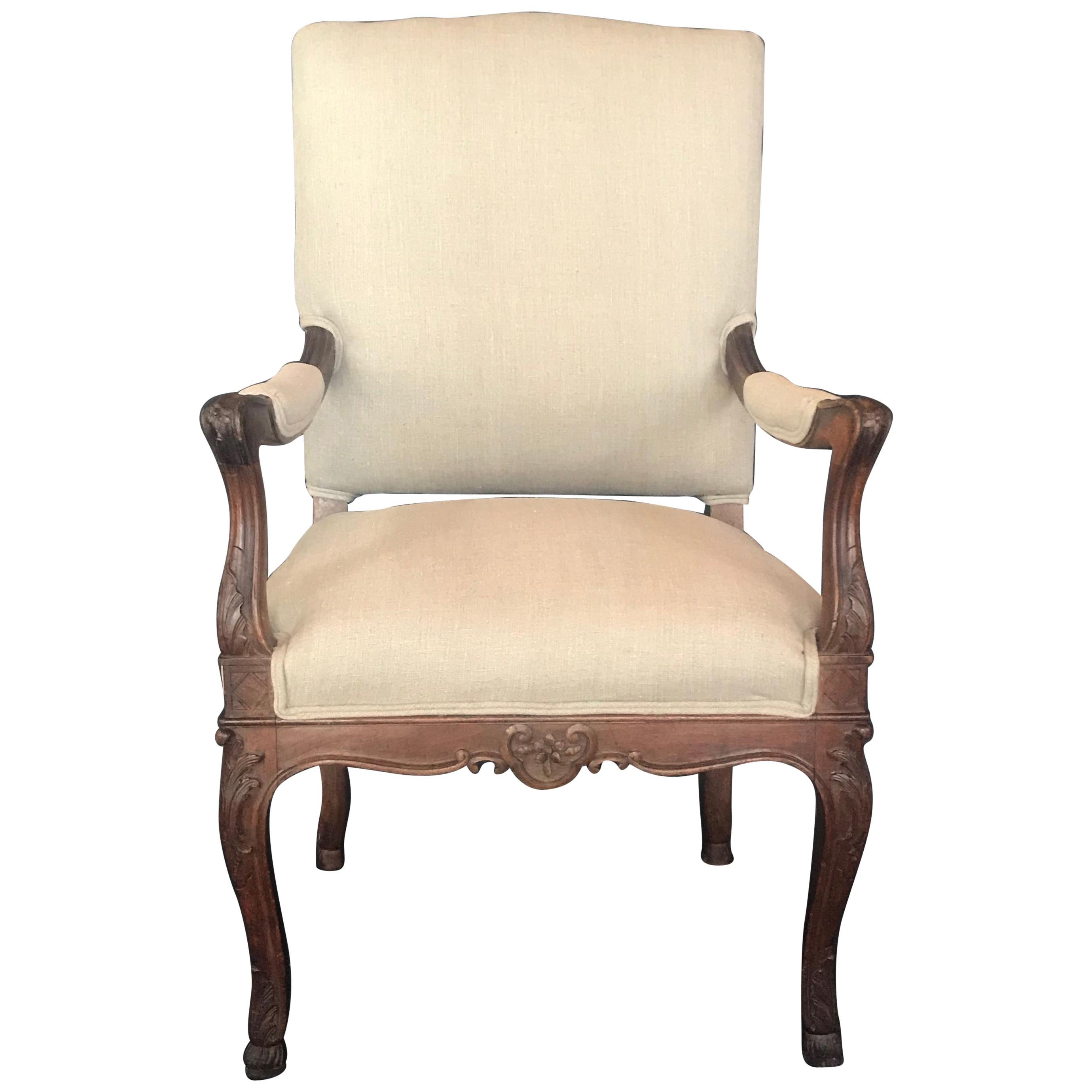 19th Century French Carved Regency Style Walnut Chair with Scrolled Arms For Sale
