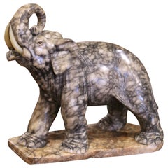 19th Century French Carved Variegated Marble Elephant with Raised Trunk