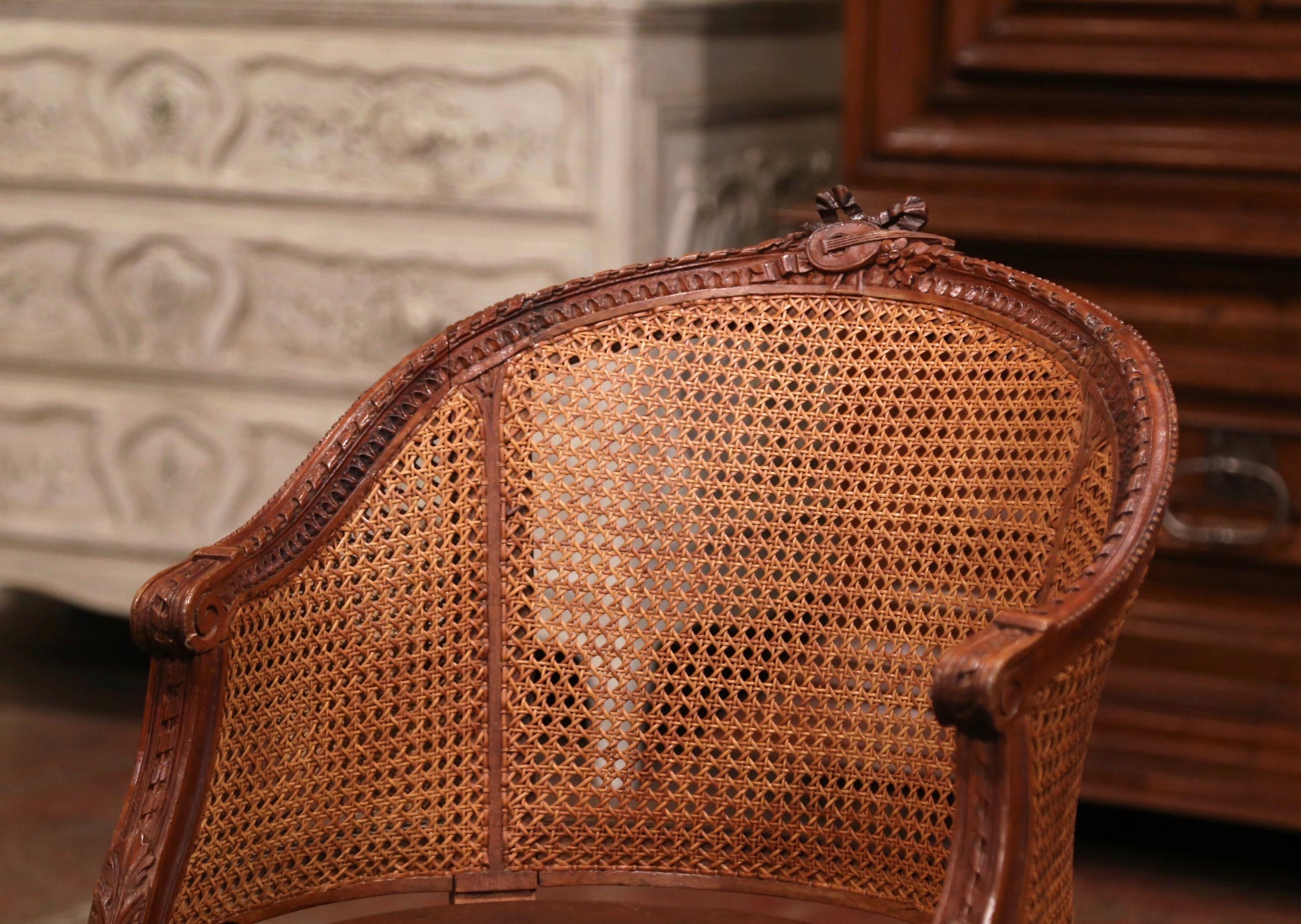 Louis XVI 19th Century French Carved Walnut and Cane Swivel Desk Armchair with Leather