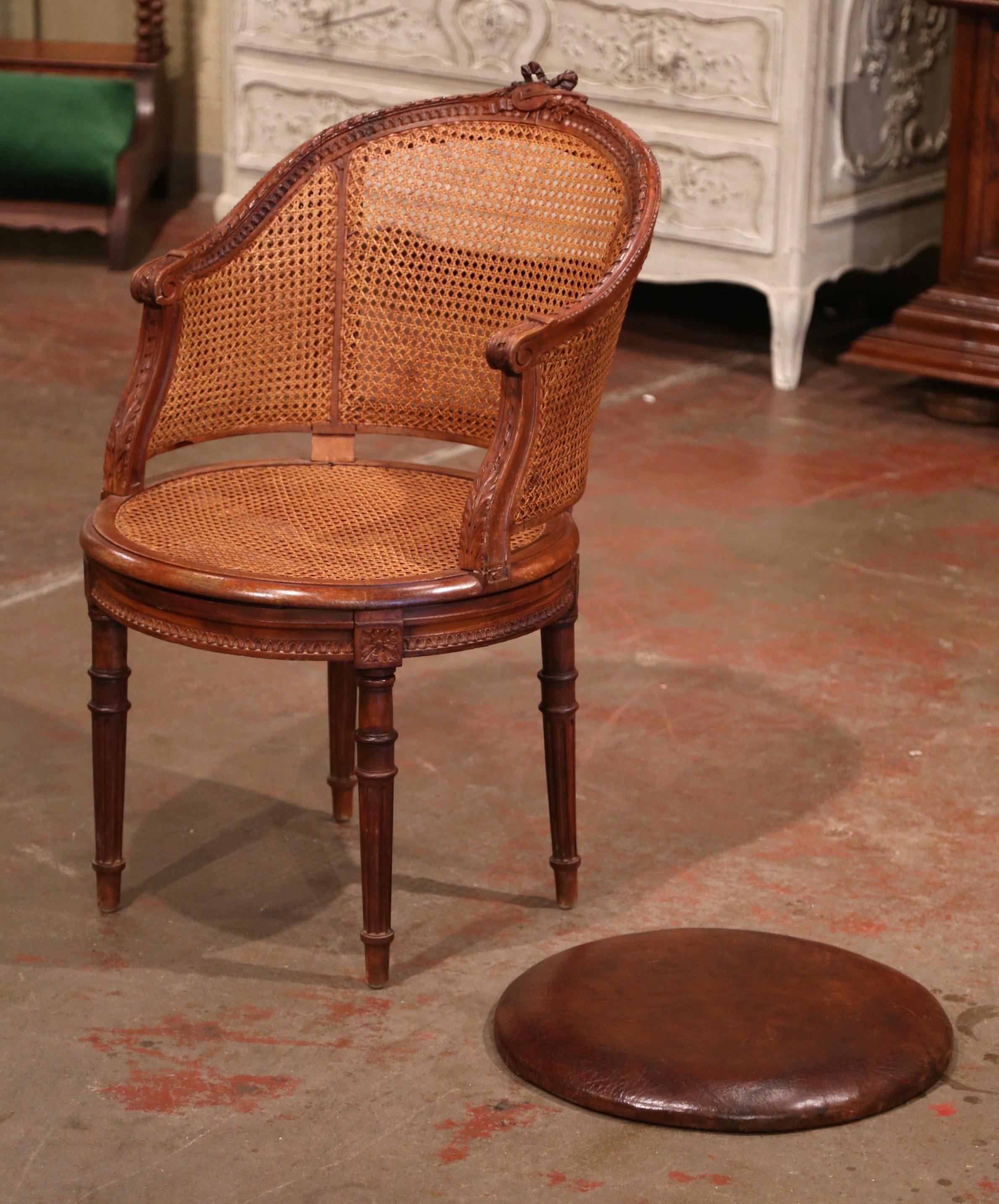 Hand-Carved 19th Century French Carved Walnut and Cane Swivel Desk Armchair with Leather