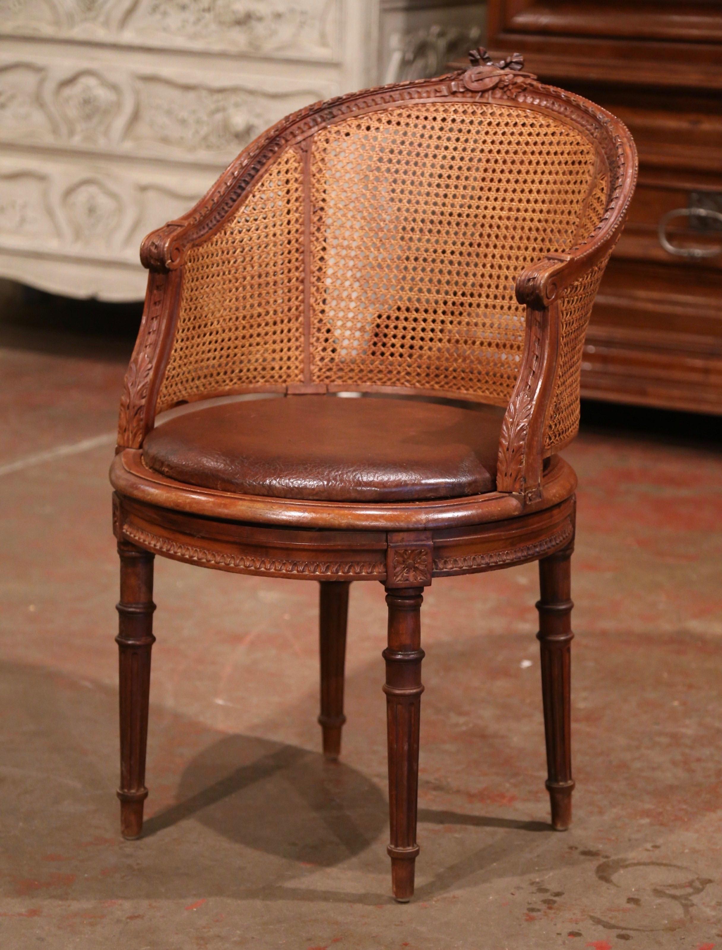 19th Century French Carved Walnut and Cane Swivel Desk Armchair with Leather In Excellent Condition In Dallas, TX