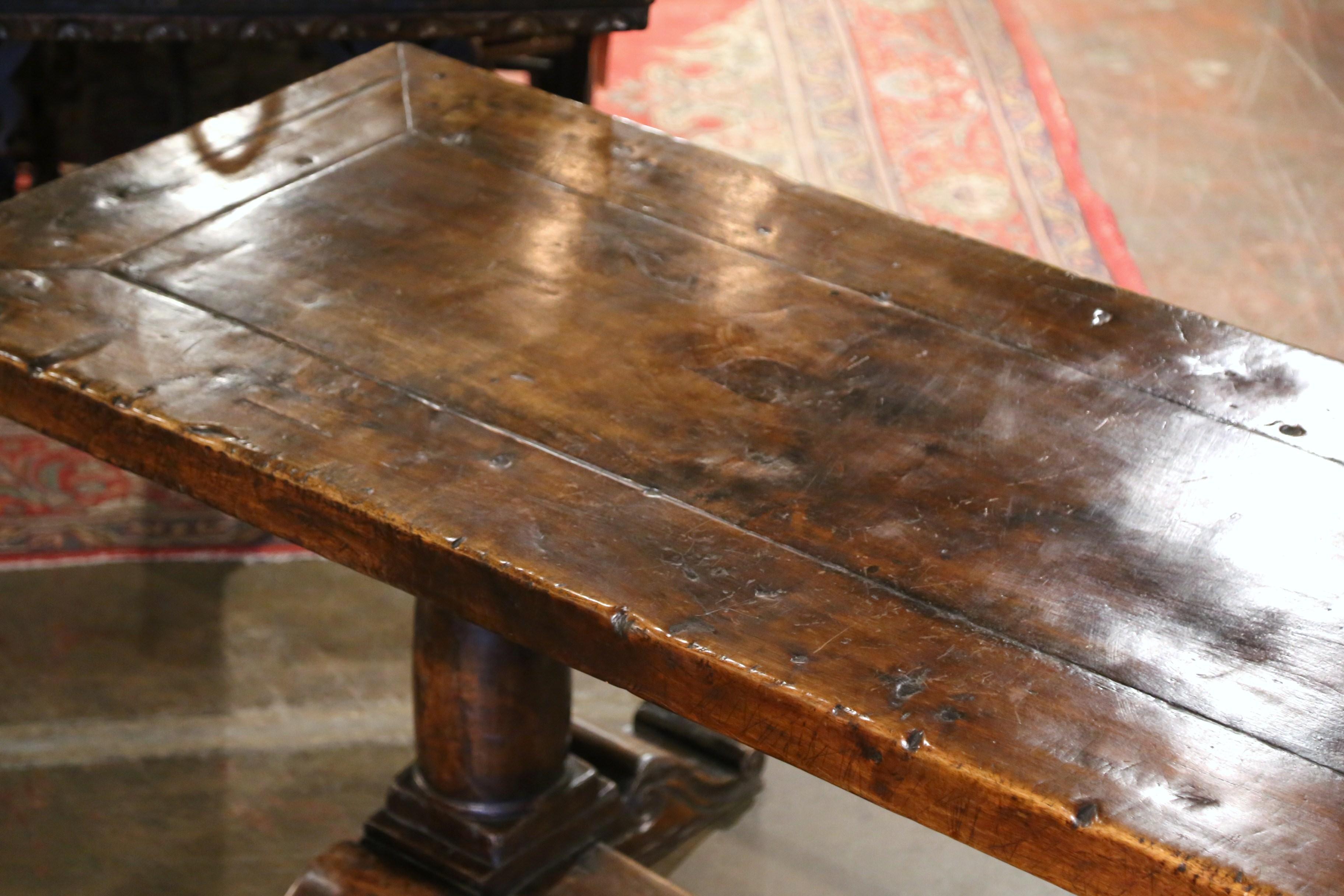 19th Century French Carved Walnut and Chestnut Trestle Dining Farm Table In Excellent Condition In Dallas, TX