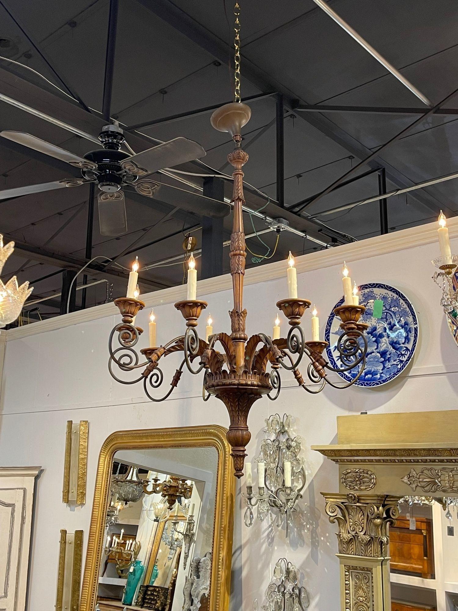 Hand-Carved 19th Century French Carved Walnut and Iron 10 Light Chandelier For Sale