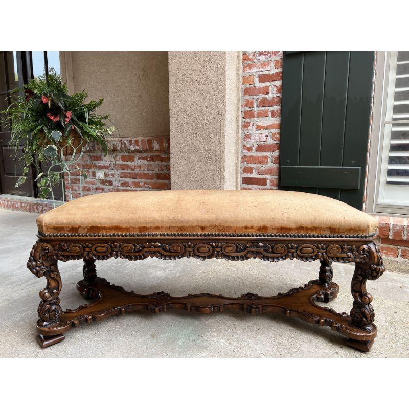 19th Century French carved walnut bench ottoman seat Louis XIV Baroque style.

Direct from France, a stunning 19th century French long bench.
The solid walnut bench frame features opulent hand carvings, clearly by a master carver, with a Black