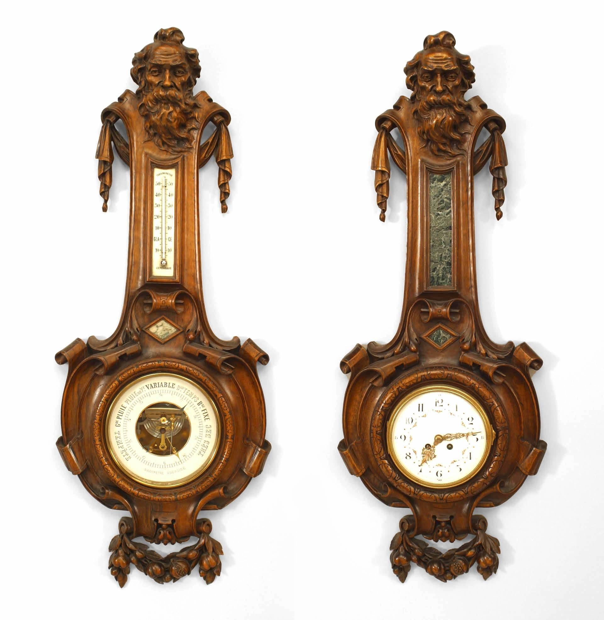 Pair of French (Mid-19th Century) clock and barometer inset into carved walnut pendant frames. Crowned bearded male heads with decorative swags, scrolls, and floral wreaths. (PRICED AS Pair) (Not working)
