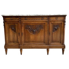 Buffet francese del XIX secolo con rose in noce intagliate e piano in marmo