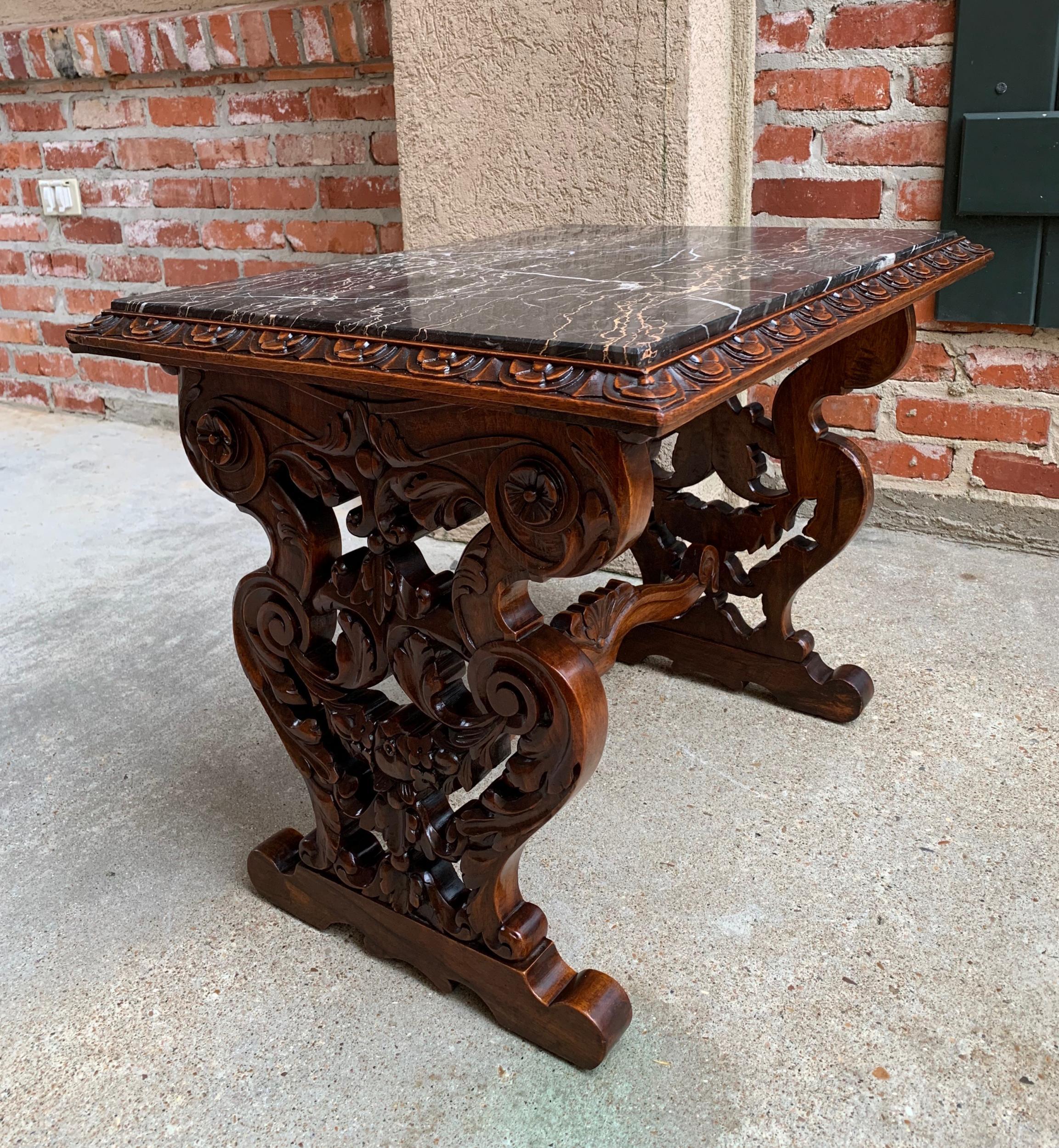 19th century French carved walnut side accent table marble top Petite Louis XV

~ Direct from France
~ Lovely antique French carved walnut accent/side table
~ Wide serpentine sides are comprised of thick open carvings that feature opulent