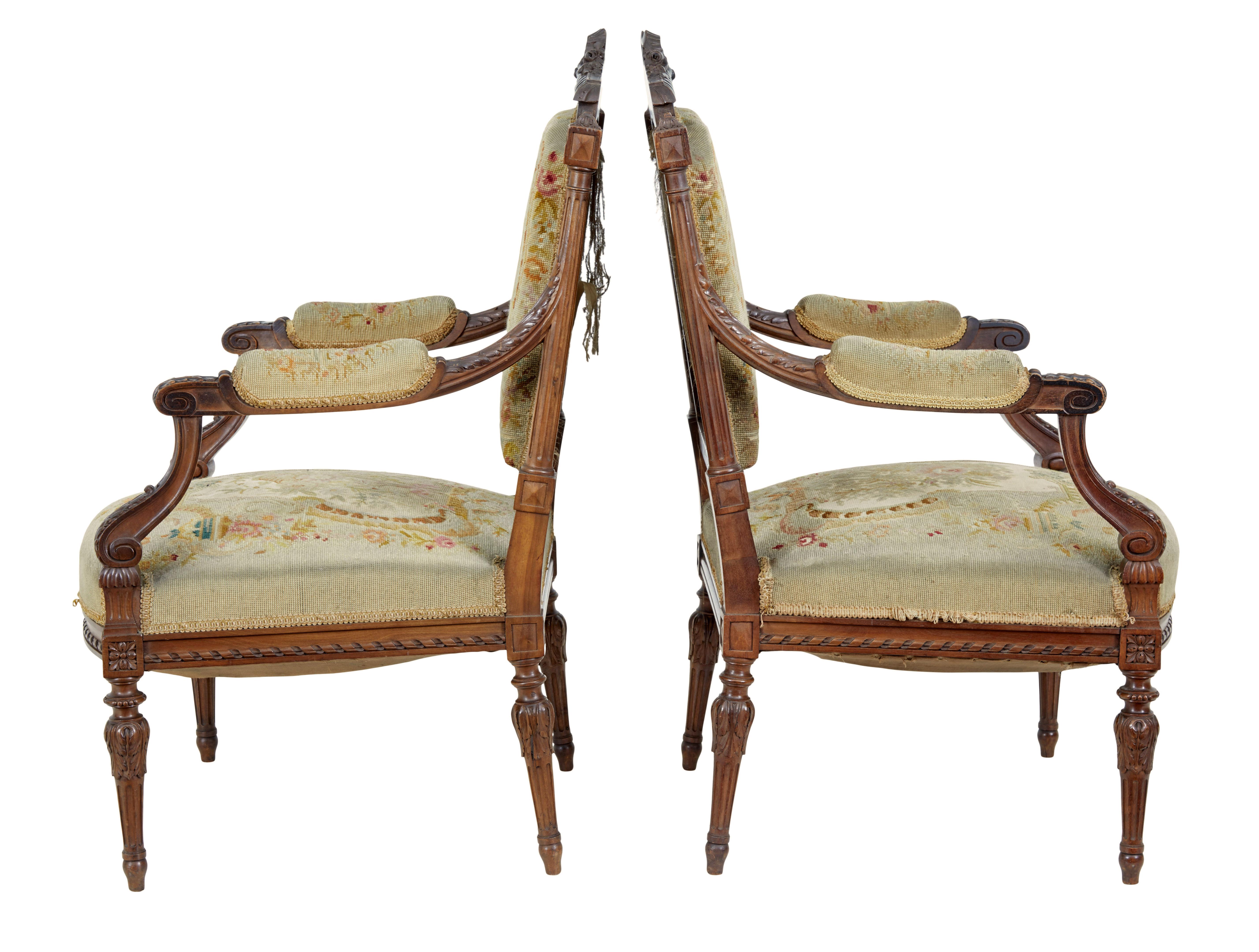 19th century french carved walnut tapestry armchairs circa 1870.

Fine quality pair of french carved armchairs, with fine craftmanship shown in the quality of the carving.

Heavily carved back rests, carved scrolled arms with acanthus leaf detail,