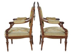 19th century French carved walnut tapestry armchairs
