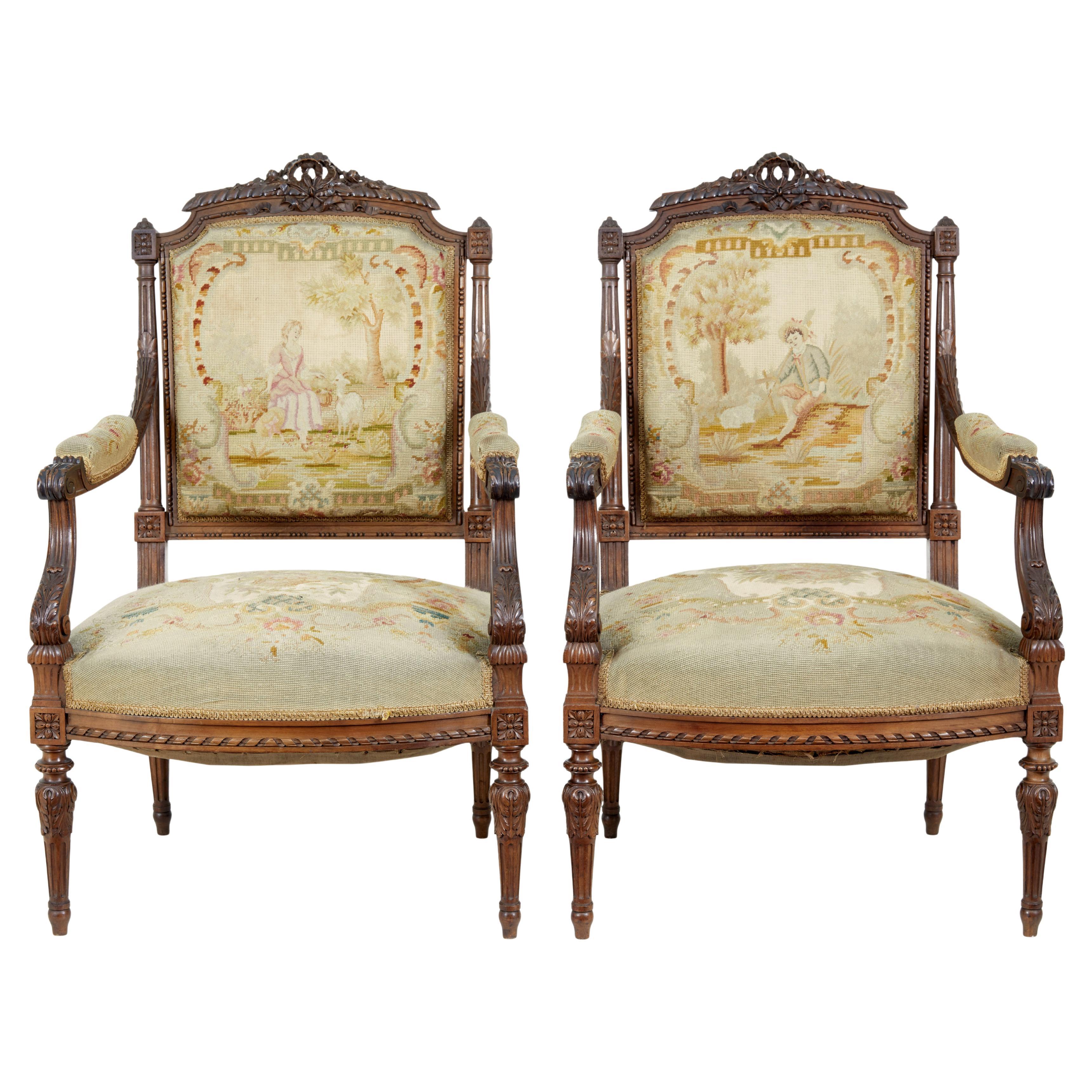 19th century French carved walnut tapestry armchairs For Sale