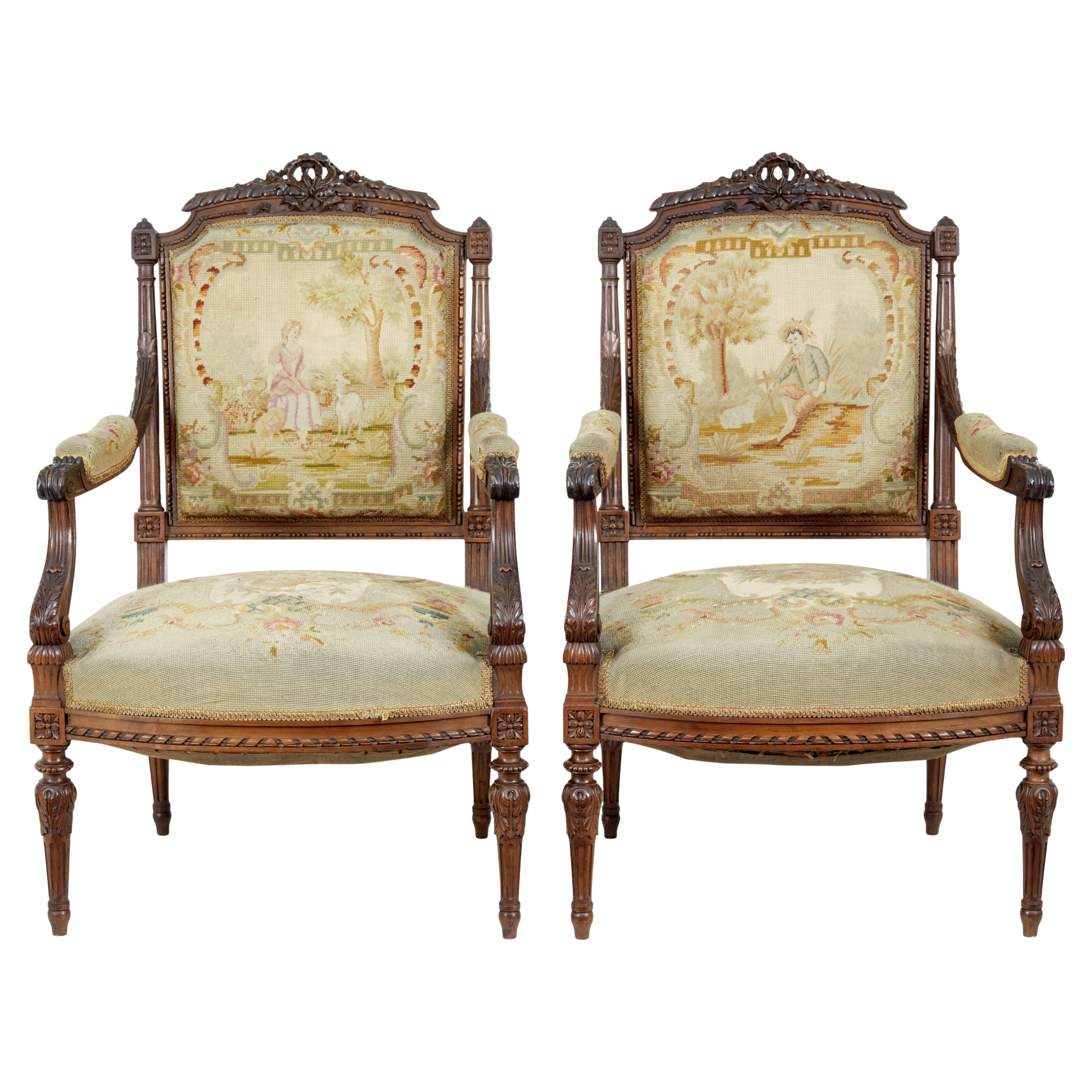 19th century French carved walnut tapestry armchairs