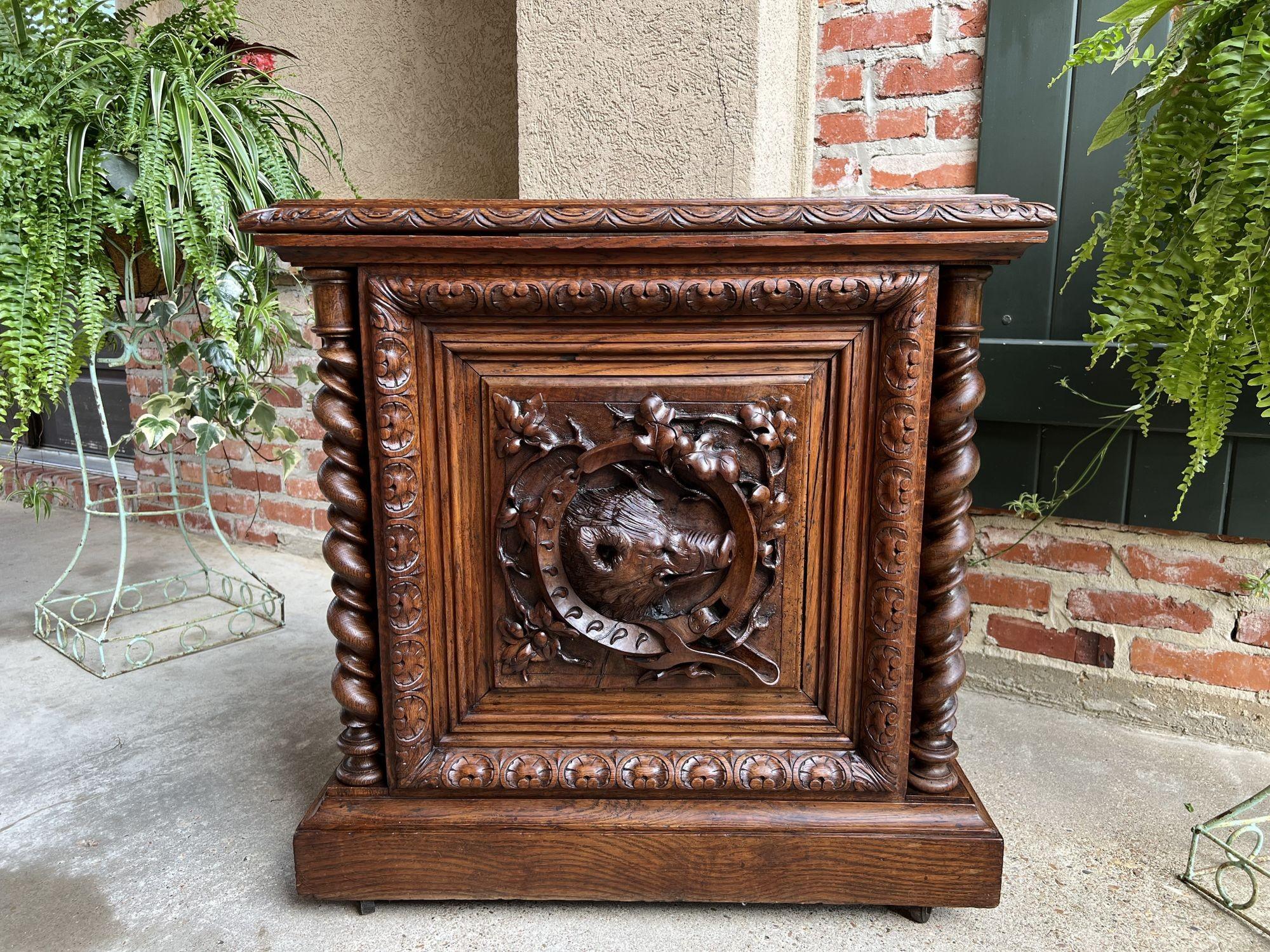 19th century French carved wine Cellarette cabinet black forest chest hog boar.
 
Direct from France, a beautiful 19th century chest, heavily carved, most probably originally used as a wine cellarette. 
Fully carved cabinet top with carved lunette
