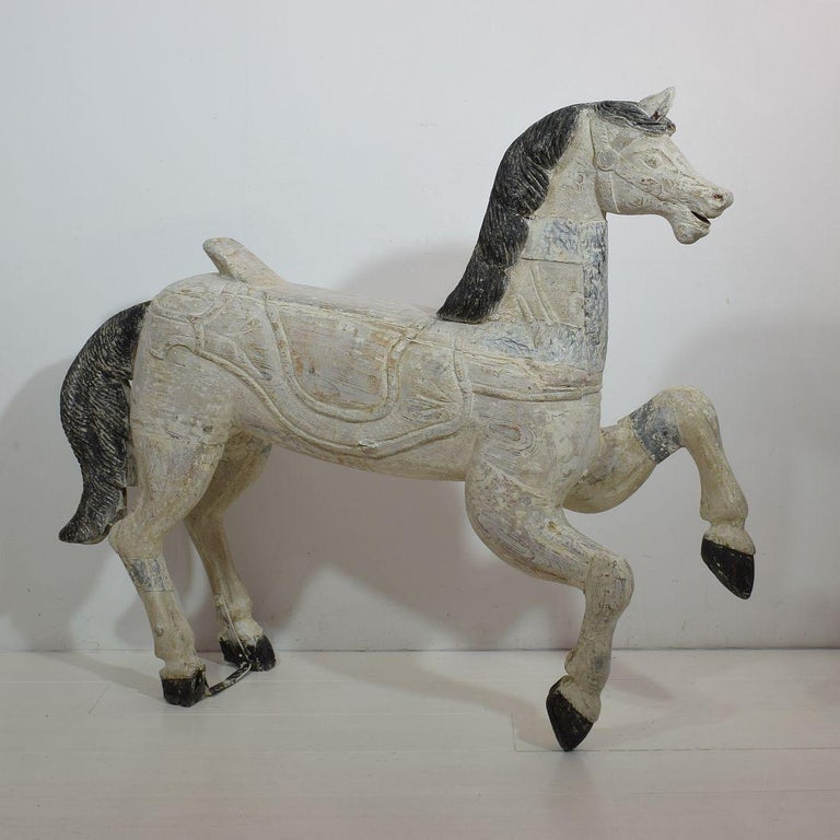 Beautiful carousel horse with traces of its original paint and the stunning patina.
France, circa 1850-1900.
Weathered, small losses and old repairs.
More pictures available on request.