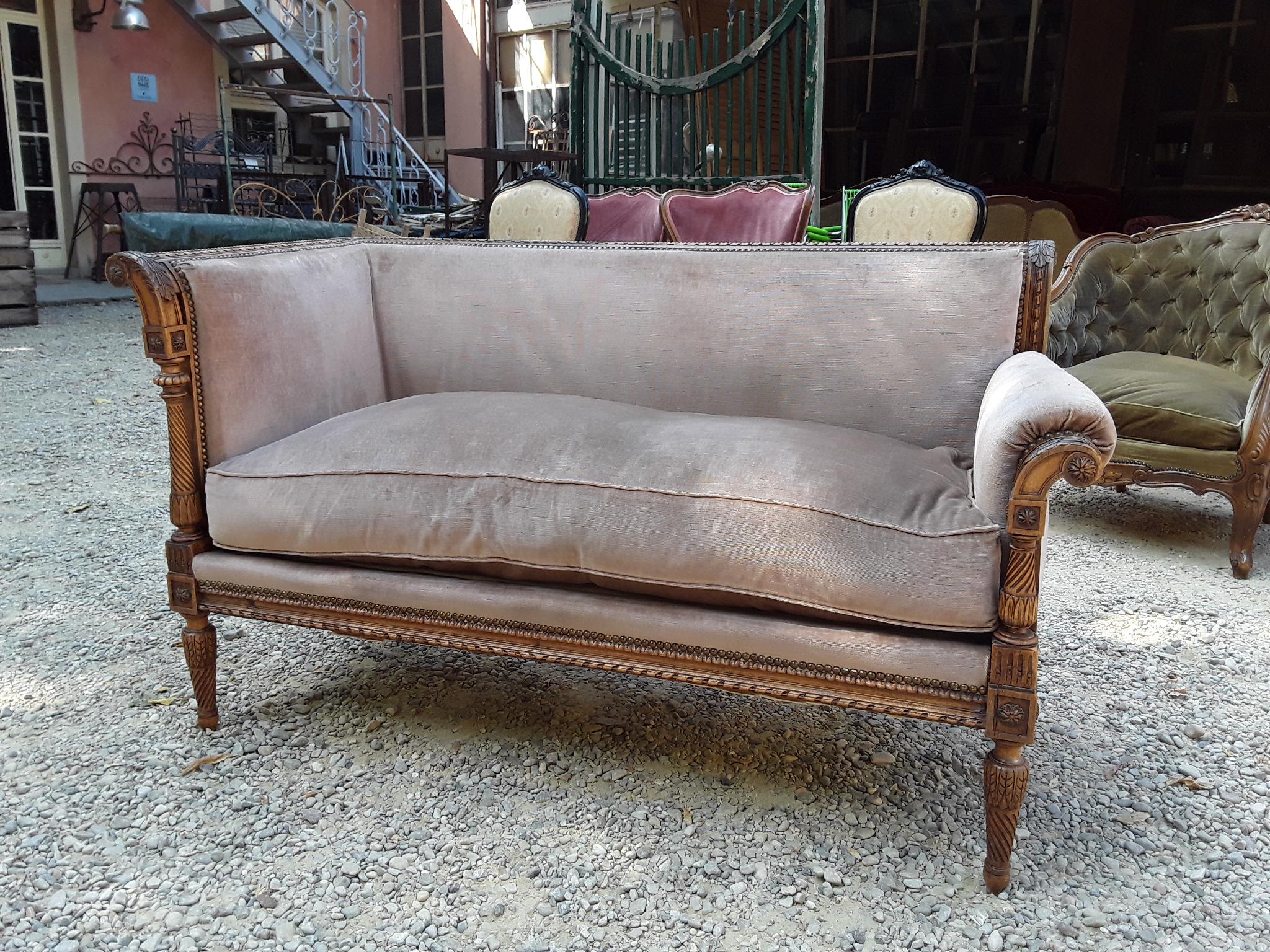 19th century French carved wood sofa with original fabric.