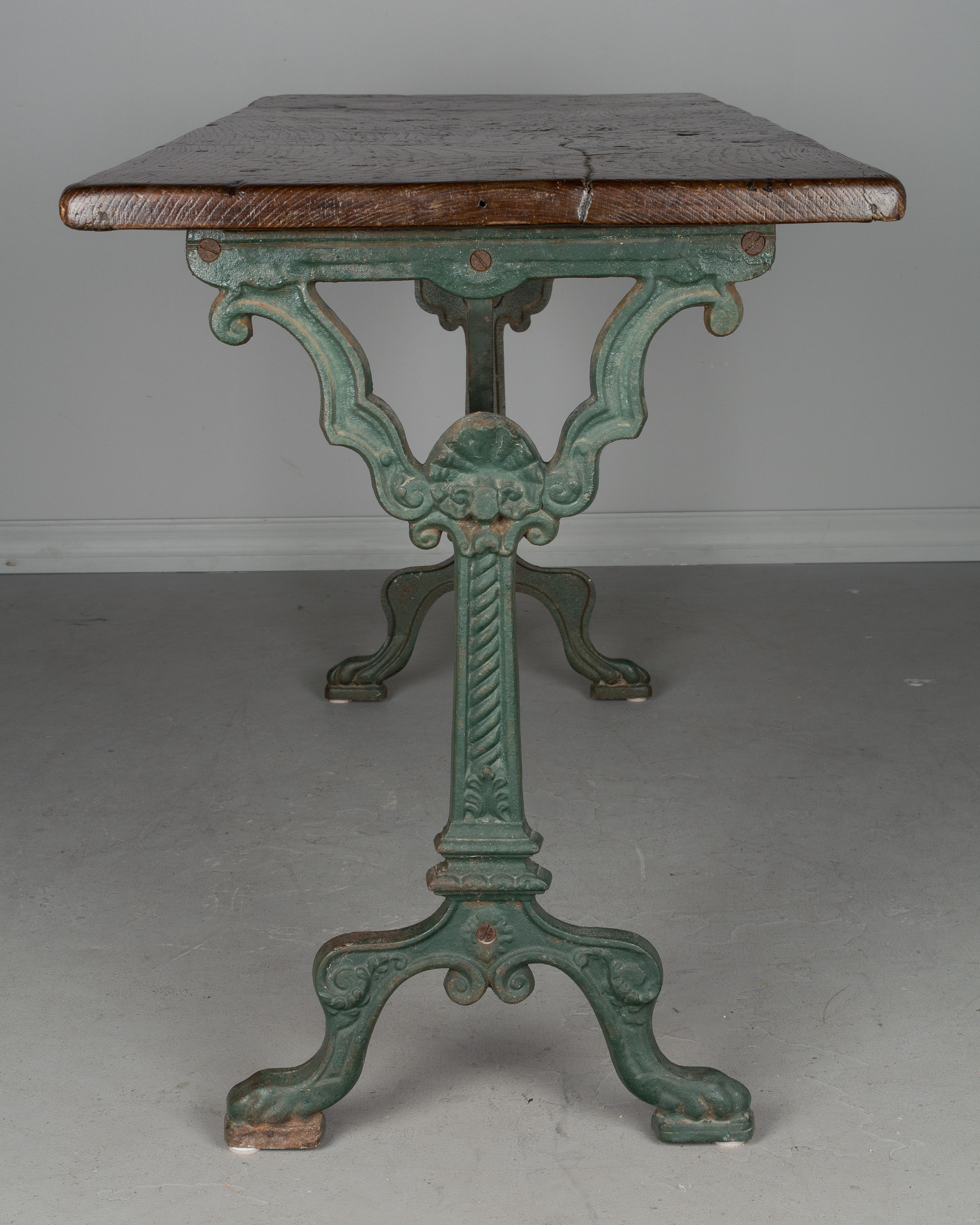 Chestnut 19th Century French Cast Iron Bistro Table