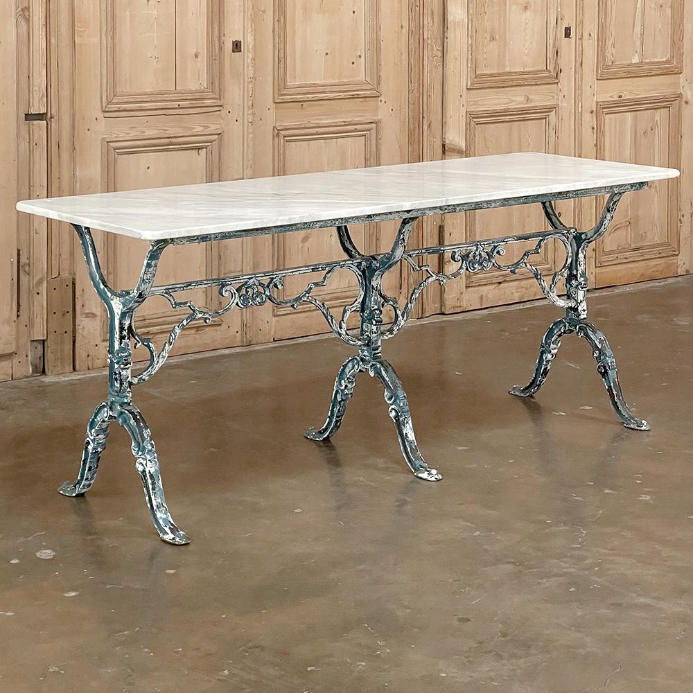 19th Century French cast iron cafe table ~ sofa table with carrara marble is a splendid example of the Belle Epoque, originally crafted as a table for a cafe or bakery that could be placed anywhere, even in front of the large glass display windows