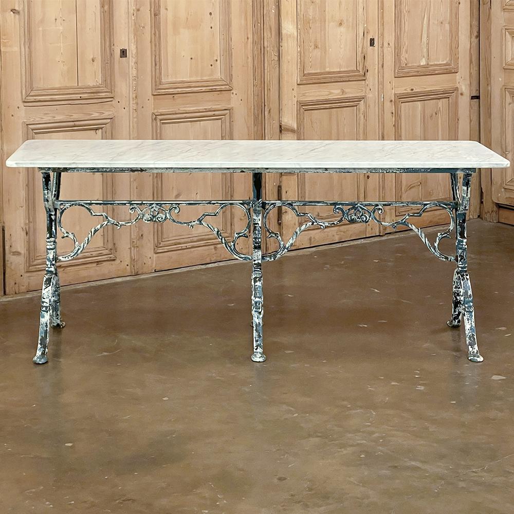 19th century French cast iron cafe table ~ sofa table with Carrara marble is a splendid example of the Belle Epoque, originally crafted as a table for a cafe or bakery that could be placed anywhere, even in front of the large glass display windows