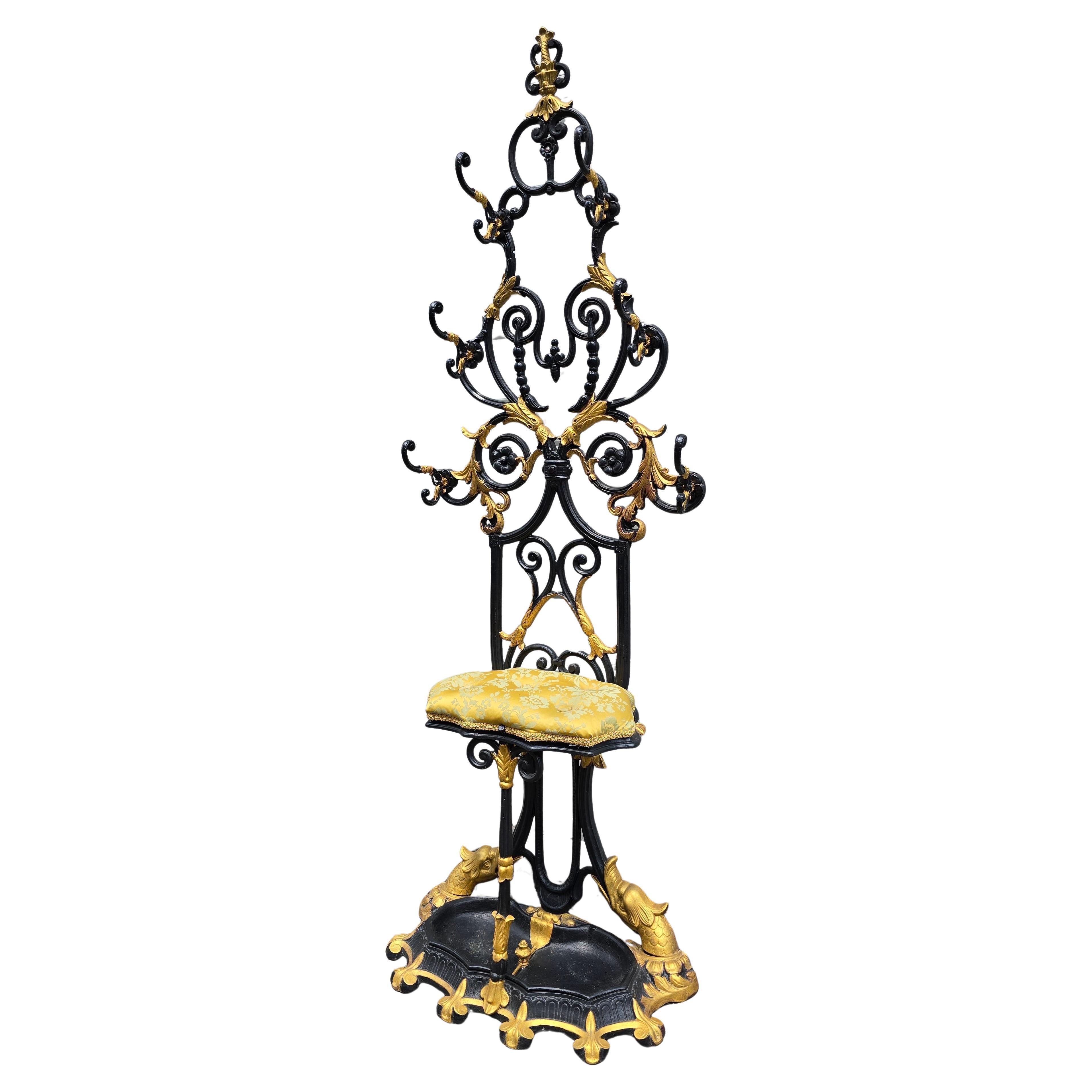 19th Century French Cast Iron Hall Stand with Gilded Accents and Converted Seat

An imposing and ornate 19th-century French cast iron hall stand, created in the Neo-Baroque style circa 1870. Originally designed as a coat and umbrella stand, this