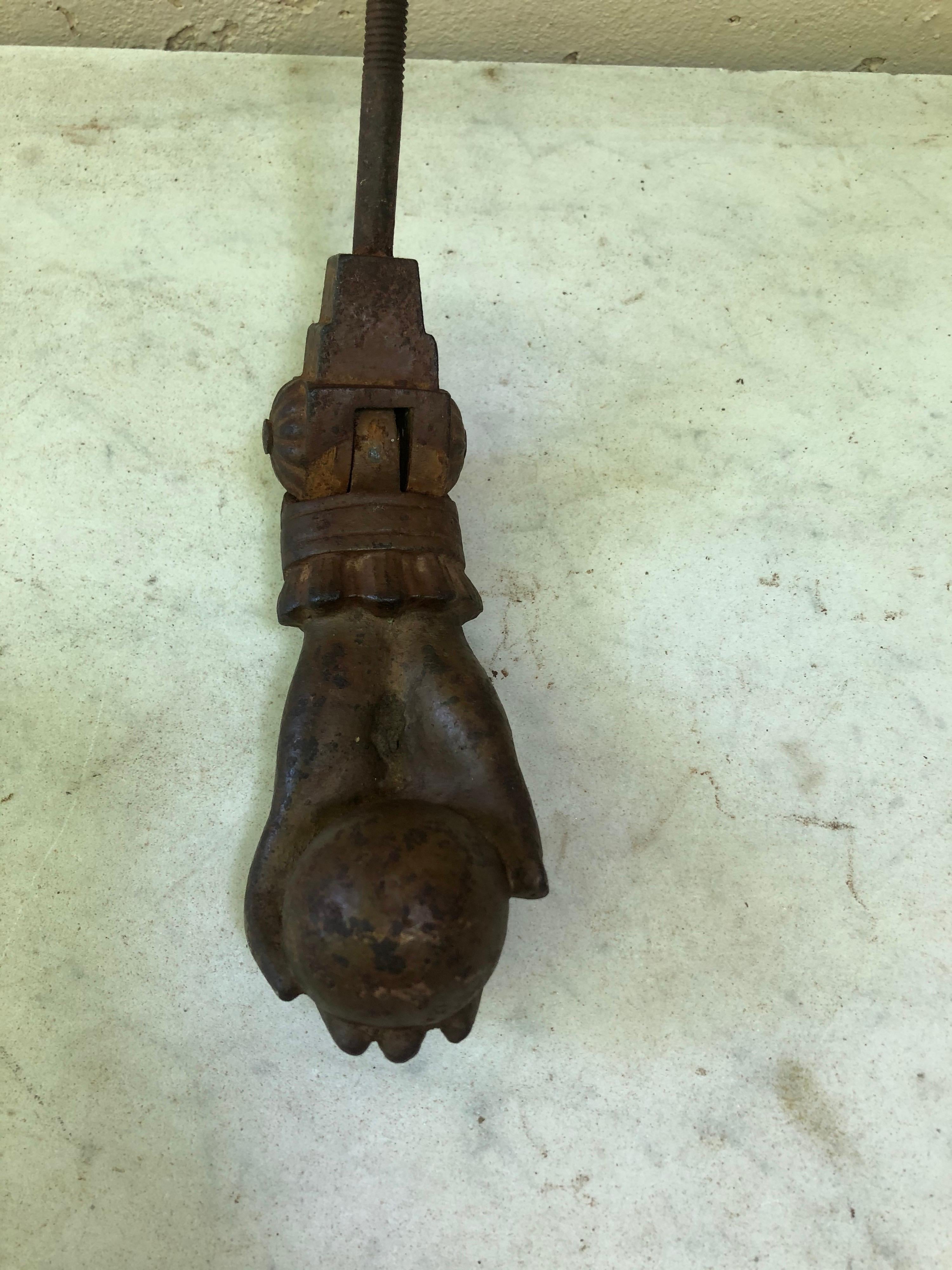 19th century French cast iron hand door knocker.