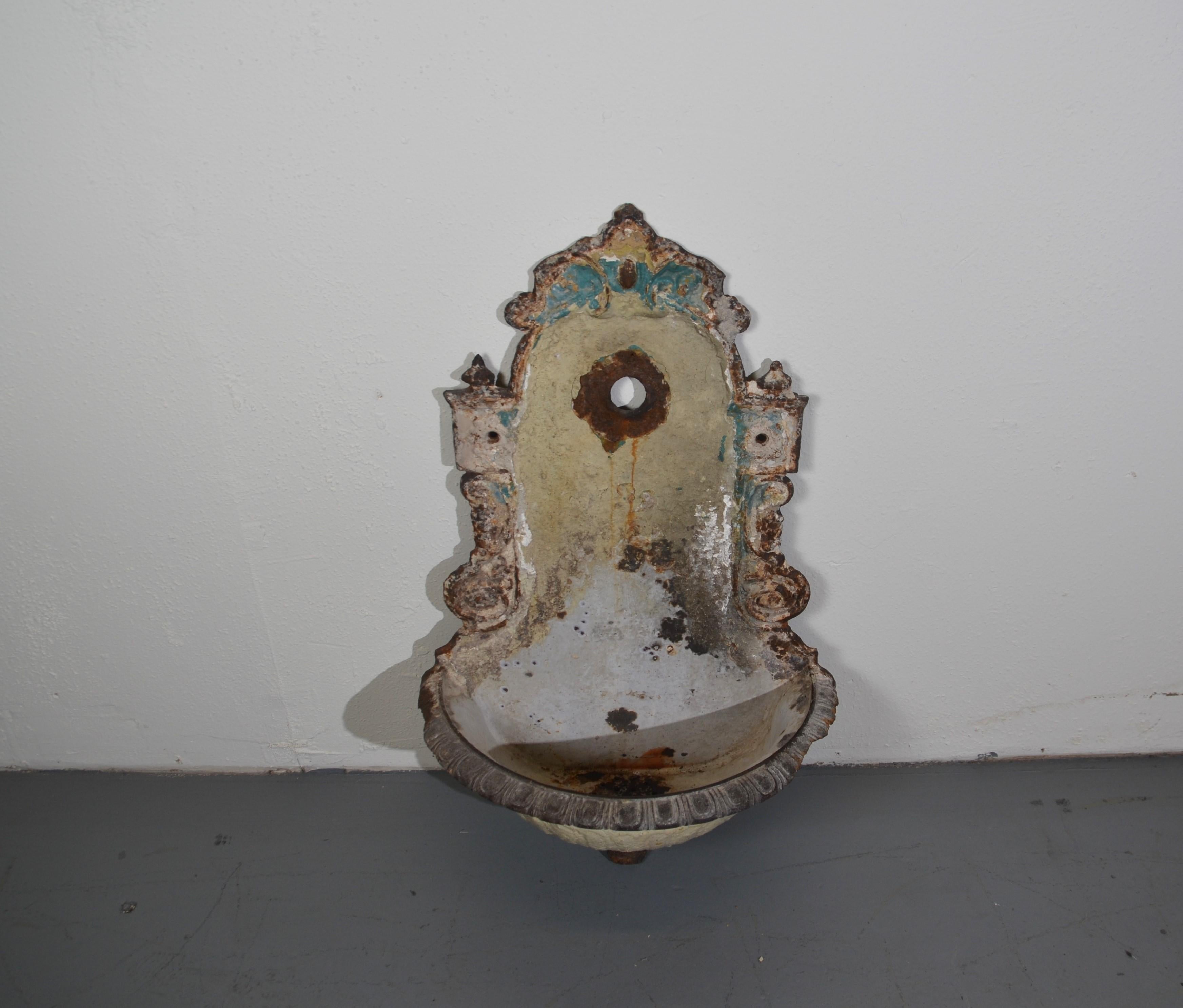 19th Century French cast iron wall water fountain.