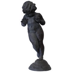 19th Century French Cast Lead Garden Cherub Statue