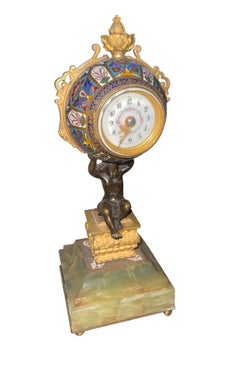 Orologio da caminetto figurativo in smalto champlevé francese del XIX secolo