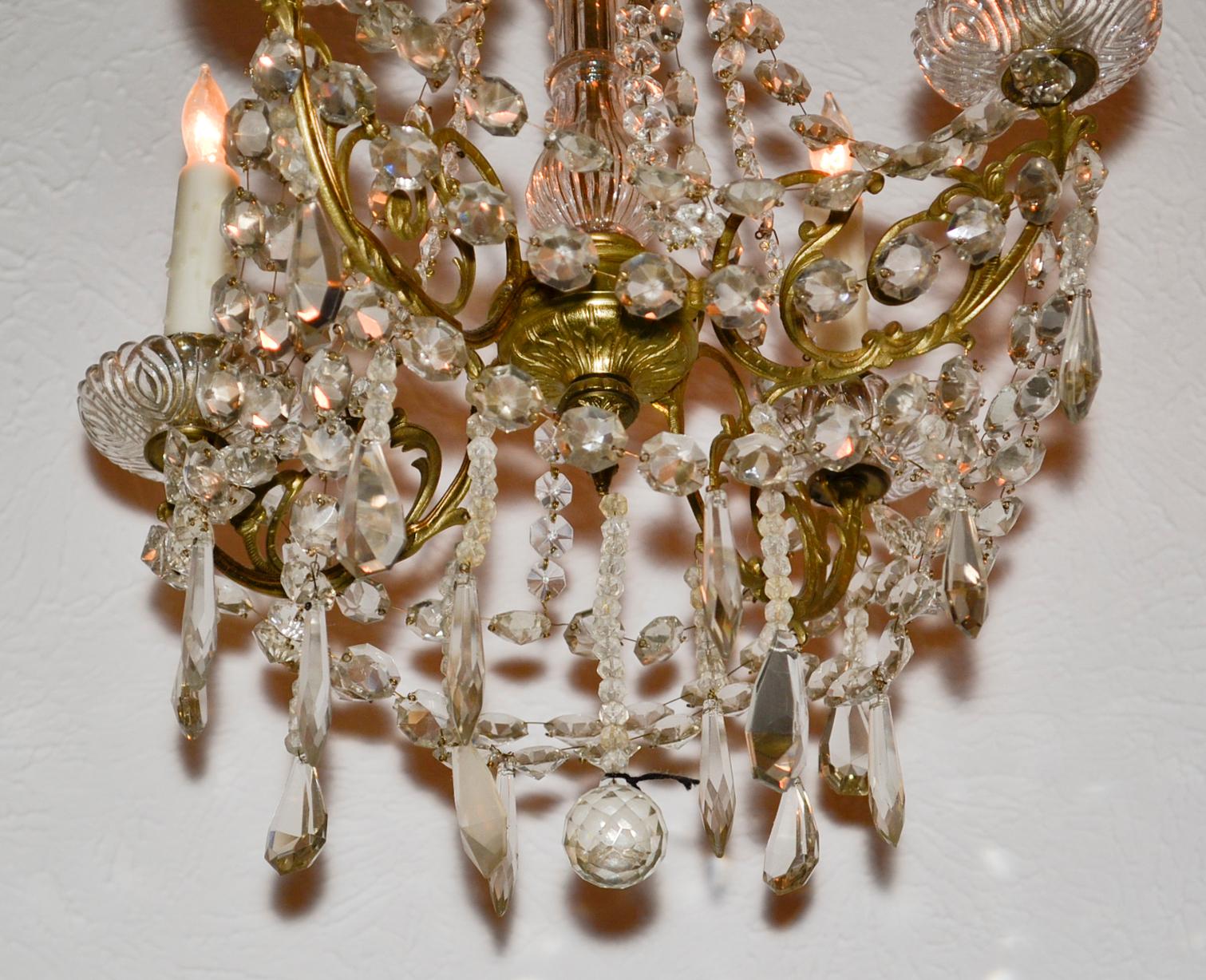Beautiful 19th century French gilt bronze and crystal 4-light chandelier.