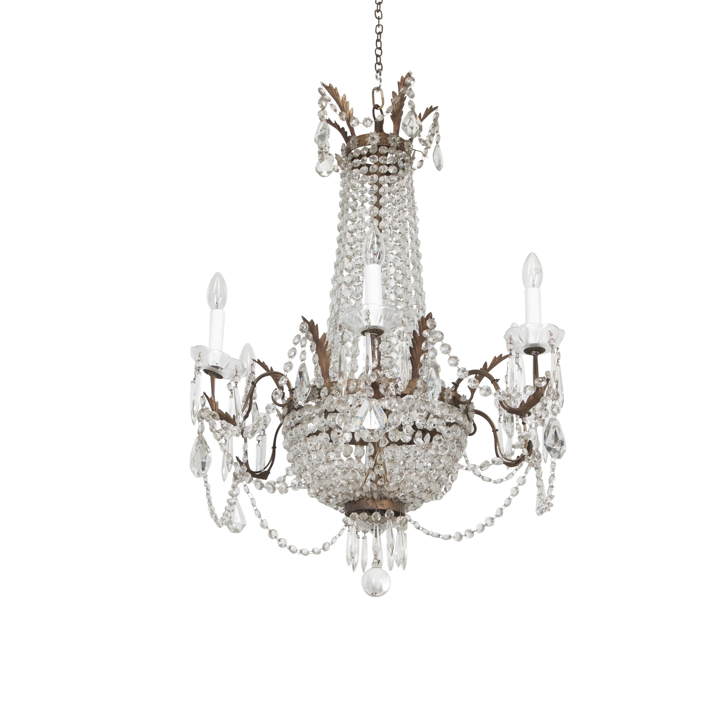 Decorative 19th Century chandelier made in France at the turn of the century.
With six arms and a gilt metal cage, this chandelier has been rewired and PAT tested to UK standards.