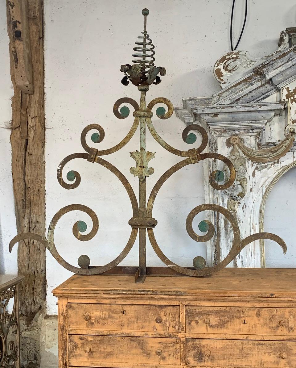 A very decorative and beautiful 19th century French architectural element from a large Chateau. The iron has a nice old weathered patina with traces of old original paint.
Mounted on a later stand for display.

Please contact us for a worldwide