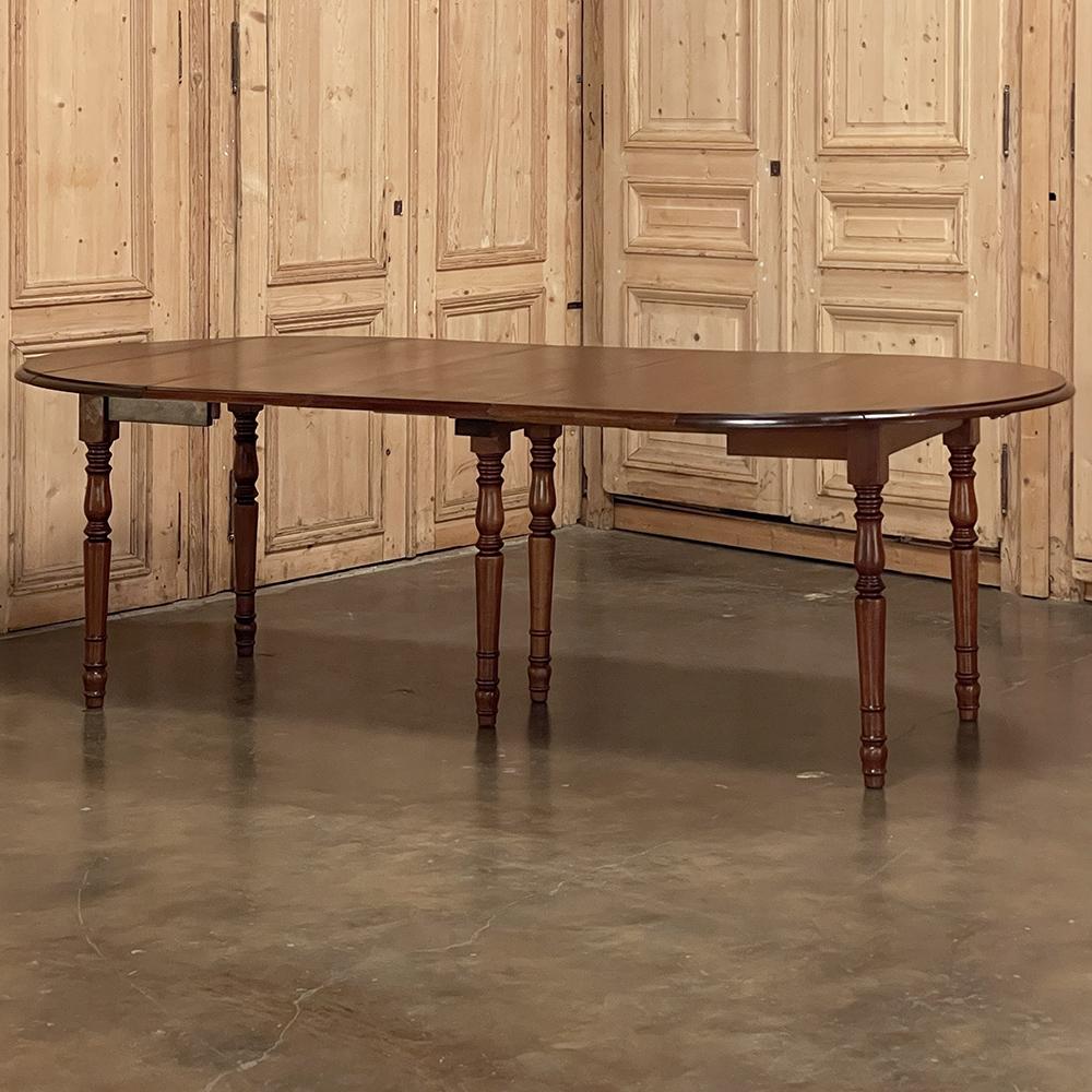 Neoclassical 19th Century French Cherrywood Drop Leaf Dining Table with Leaves For Sale