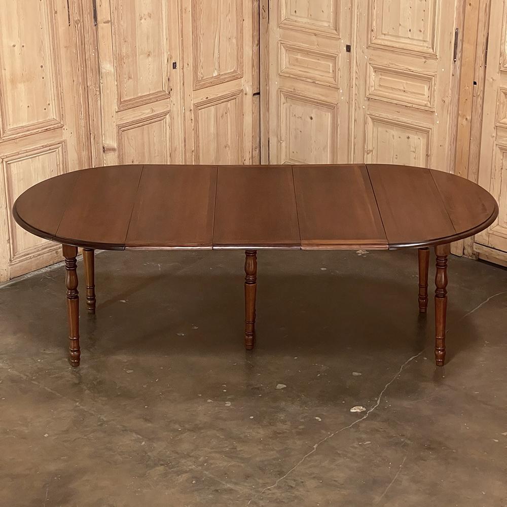 Hand-Crafted 19th Century French Cherrywood Drop Leaf Dining Table with Leaves For Sale