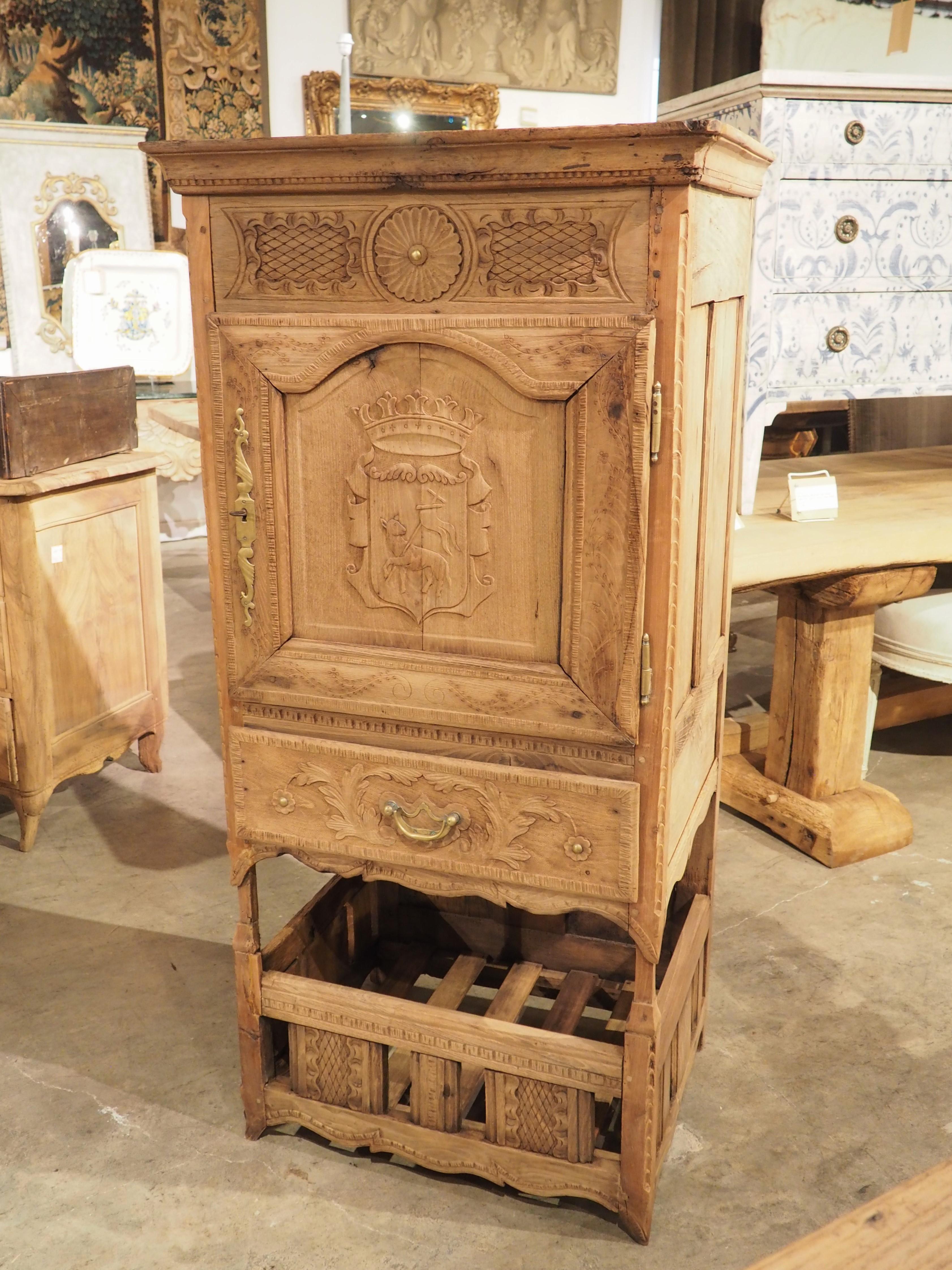 Known as a garde manger, this chestnut food cabinet was hand-carved in the 1800’s in Normandy. Although the term now refers to restaurant prep stations, the French “garde manger” has been the term used for hundreds of years to describe a small