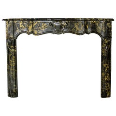 Antique 19th Century French Chimneypiece in Portoro Marble in the Louis XV Manner