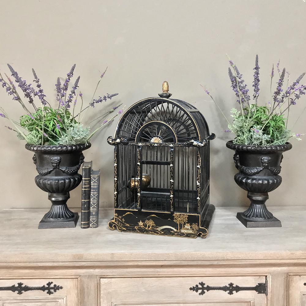 19th century hand-painted French Chinoiserie bird cage was handcrafted and hand-painted in the Japanese style, with ebonized wood and exquisitely painted surfaces all around, providing an opulent residence for your avian friend!
circa