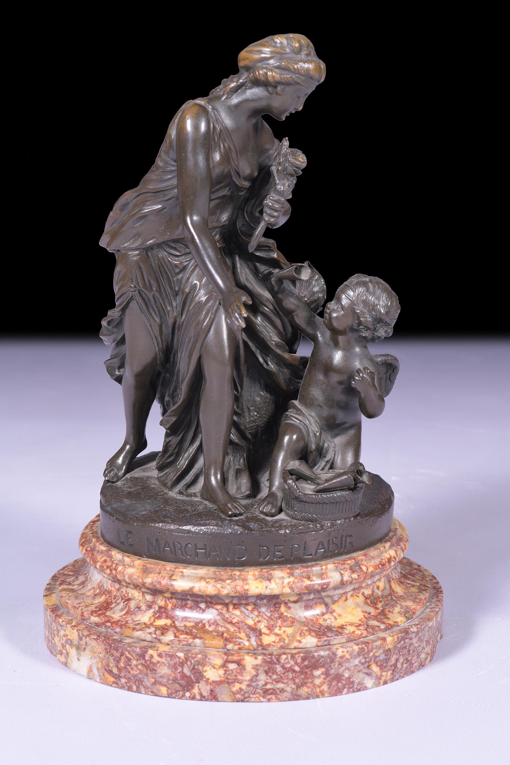 A superb bronze model of a classical maiden and a putto entitled 'Le Merchand de Plaisir' the winged putto holding a posey vase, the maiden with a rose, on a naturalistic base, signed Pigal, on a cylindrical marble base.

Circa