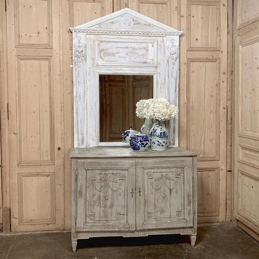 19th century French Classical Trumeau features architecture that would make any ancient Greek statesman proud! hand carved relief work appears centered on the gable as well as at the top of each side, with draped fabric, crown, bell flower, and urn