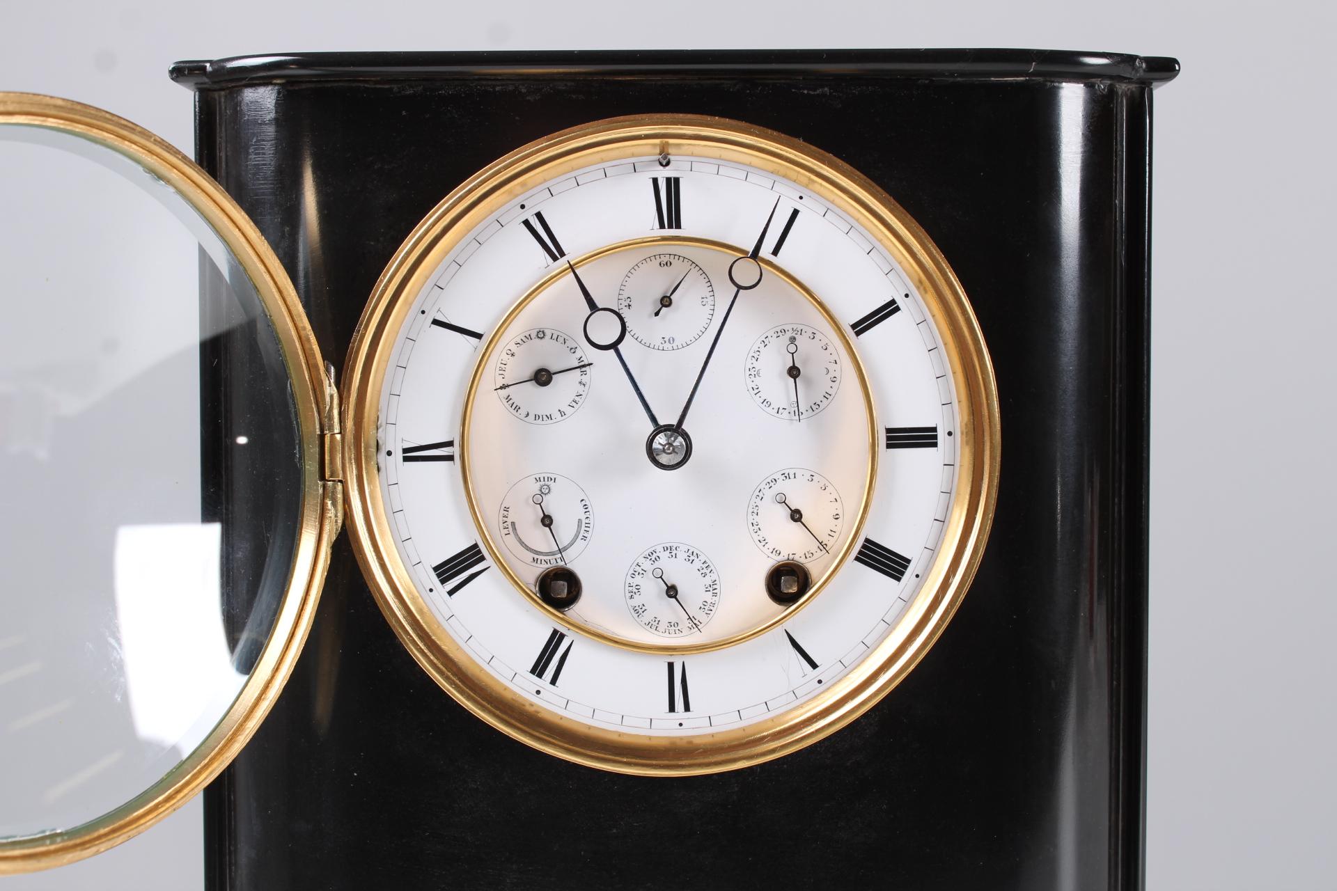 Rare mantel clock with six complications

Paris
marble, enamel
around 1860-1870

Dimensions: H x W x D: 30 x 24 x 14 cm

Extremely rare historicism pendulum in black marble case typical of the period. Curved base, slightly protruding top