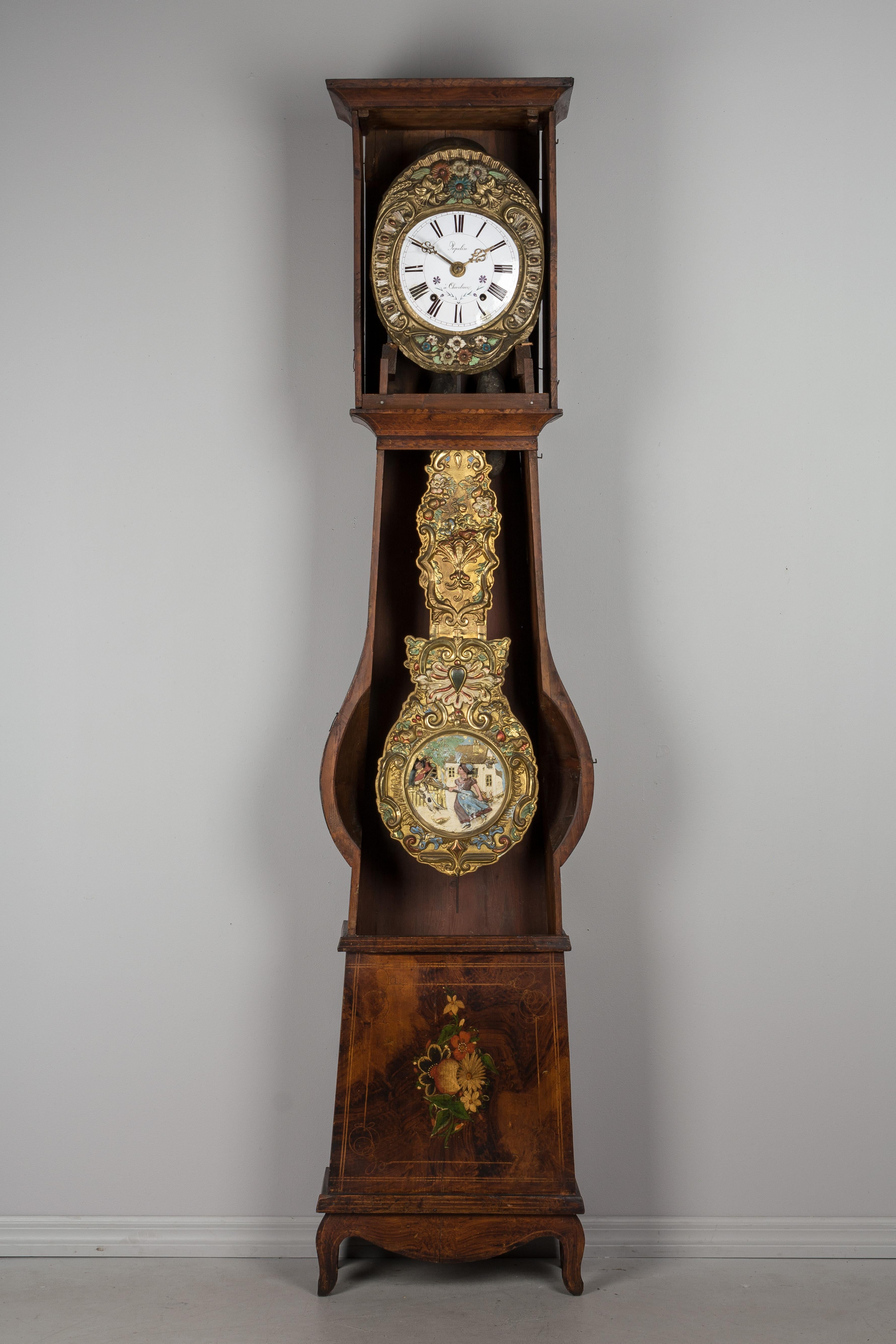 A French country comtoise, or grandfather clock, with polychrome painted pine case and embossed brass pendulum. Original seven day Morbier movement, professionally cleaned and in working order, having an enamel face signed by the clockmaker, Popelin