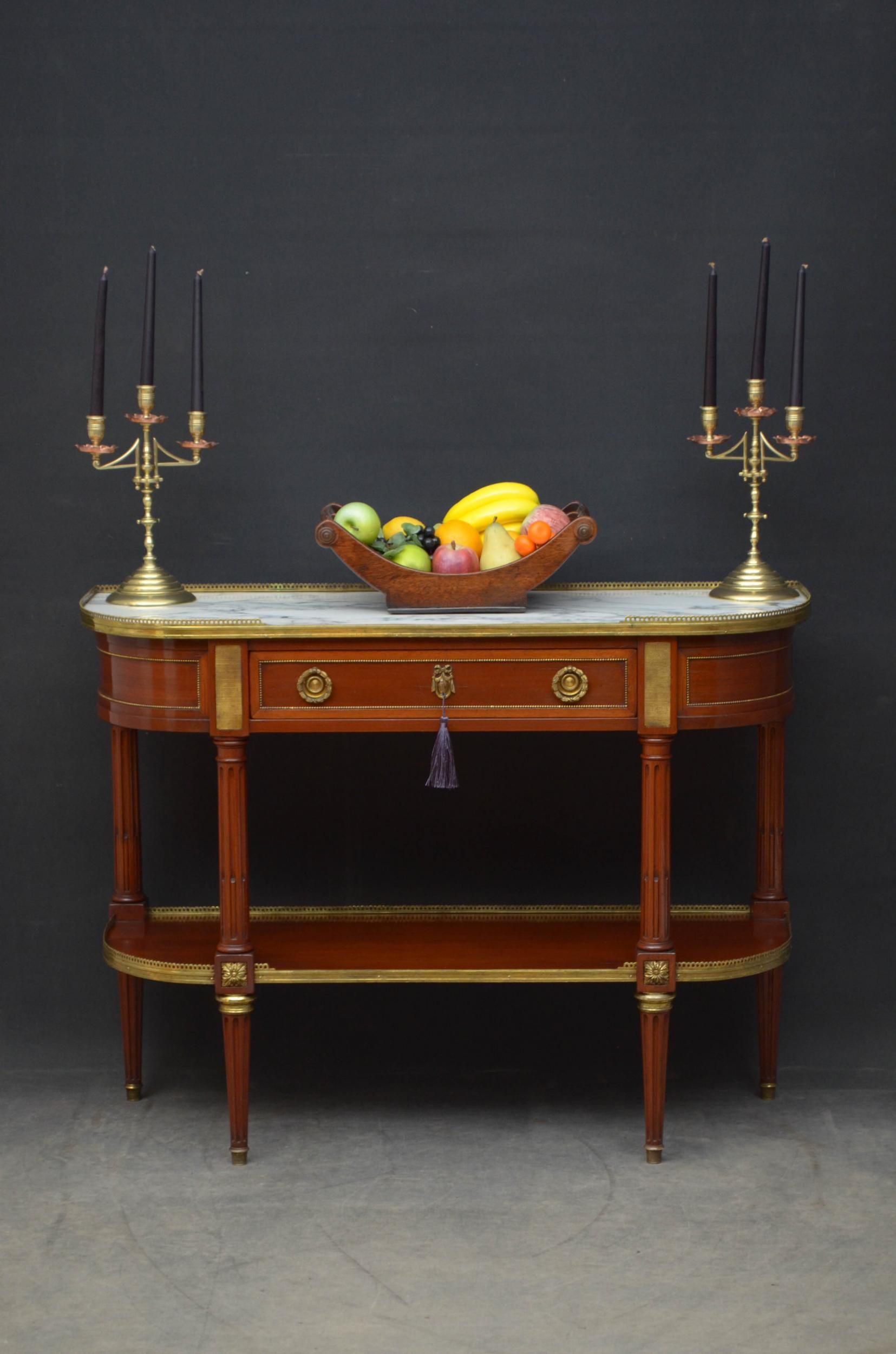 Sn5023 fine quality and very attractive XIXth century D shaped console table or serving table in mahogany, having original brass gallery to the edge and a white veined marble top above a frieze drawer panelled and brass beaded frieze enclosing a
