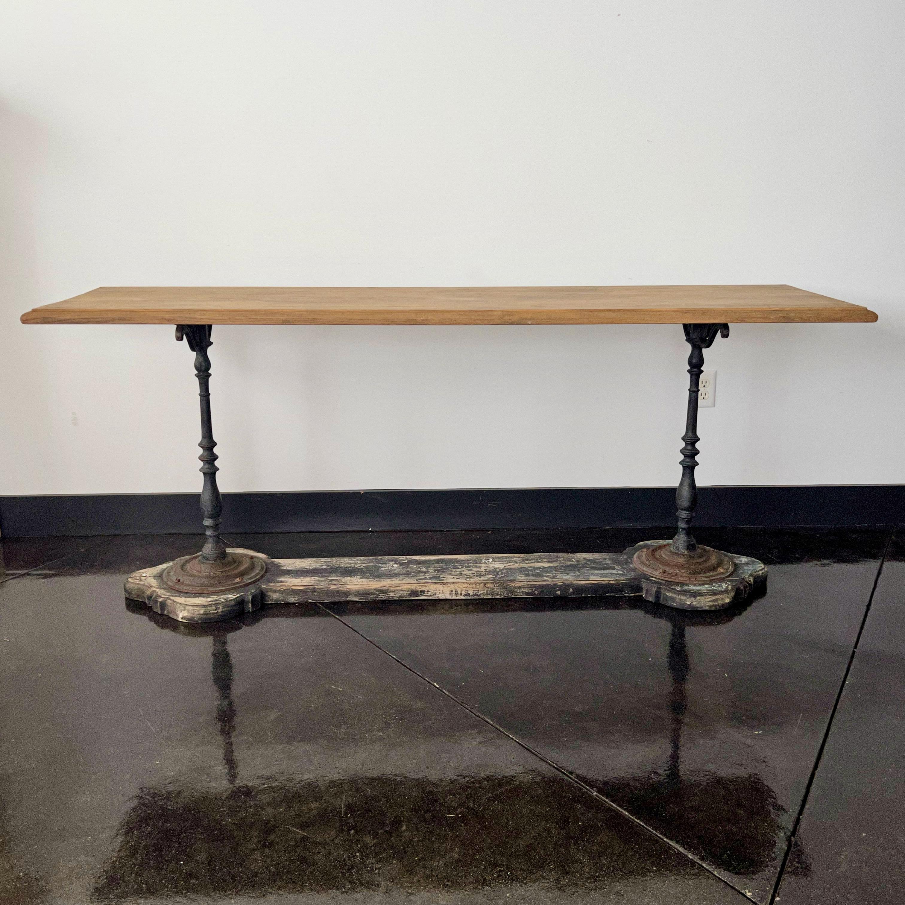 19th Century French unusual shape console/serving/display table with thick oak top and wrought iron/shaped wood base.
Narrow, unusual table in any room.
 