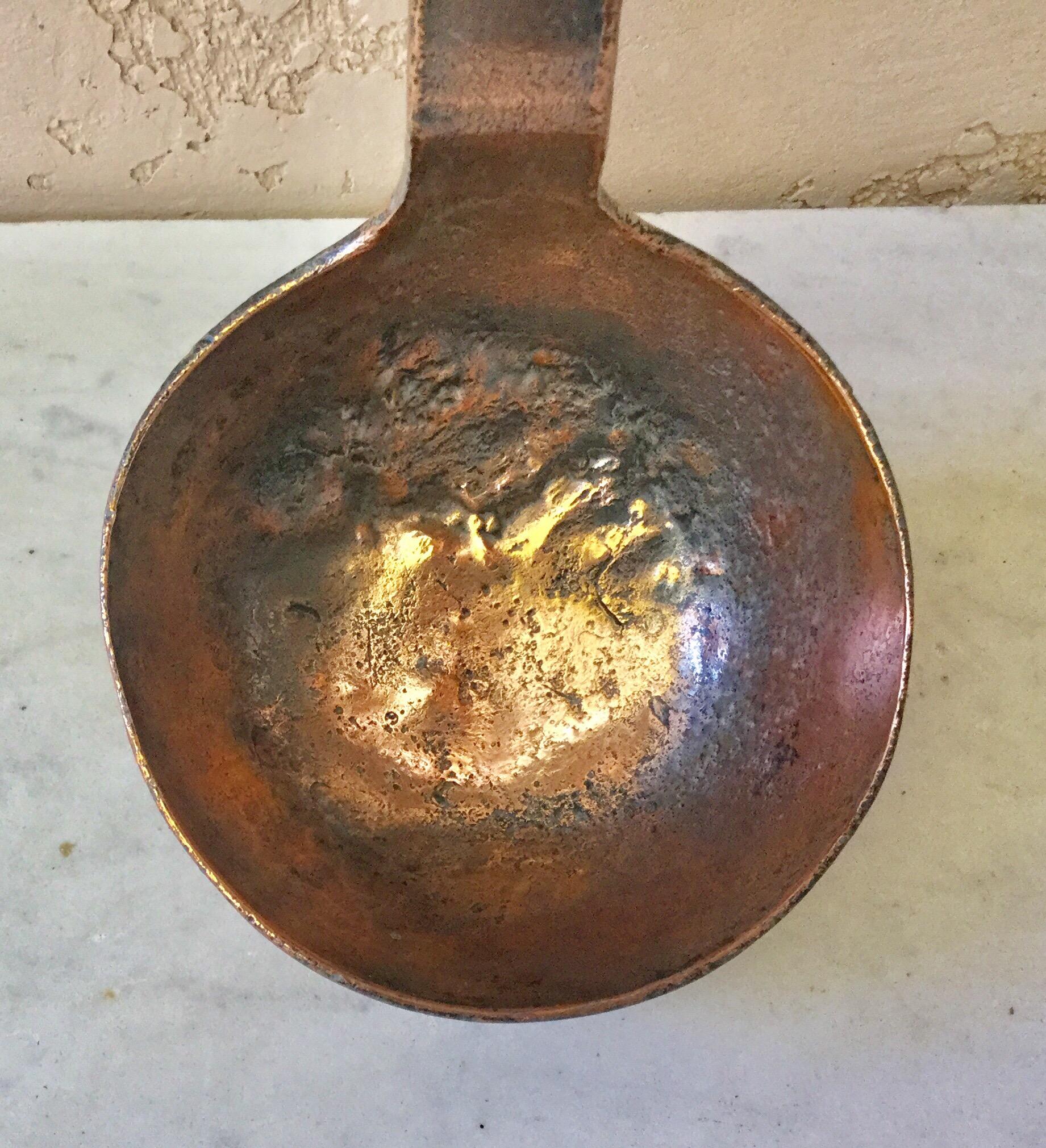 antique copper ladle