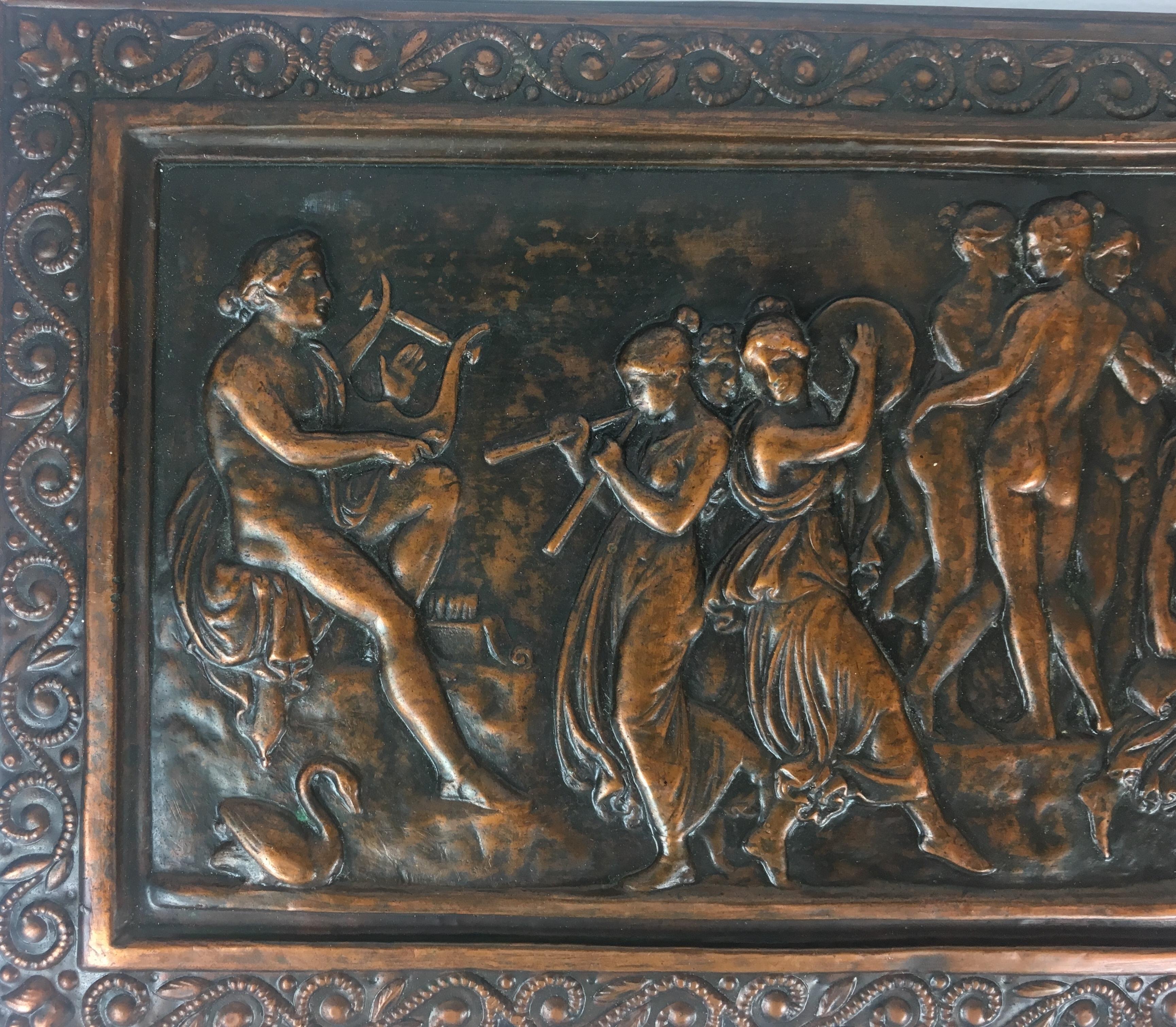 19th century French copper hand-hammered copper plaque depicting a celebration of women: musicians, bathers and others in period costumes.

The detailed work is beautiful. 
Professionally framed in Russia, 1980.