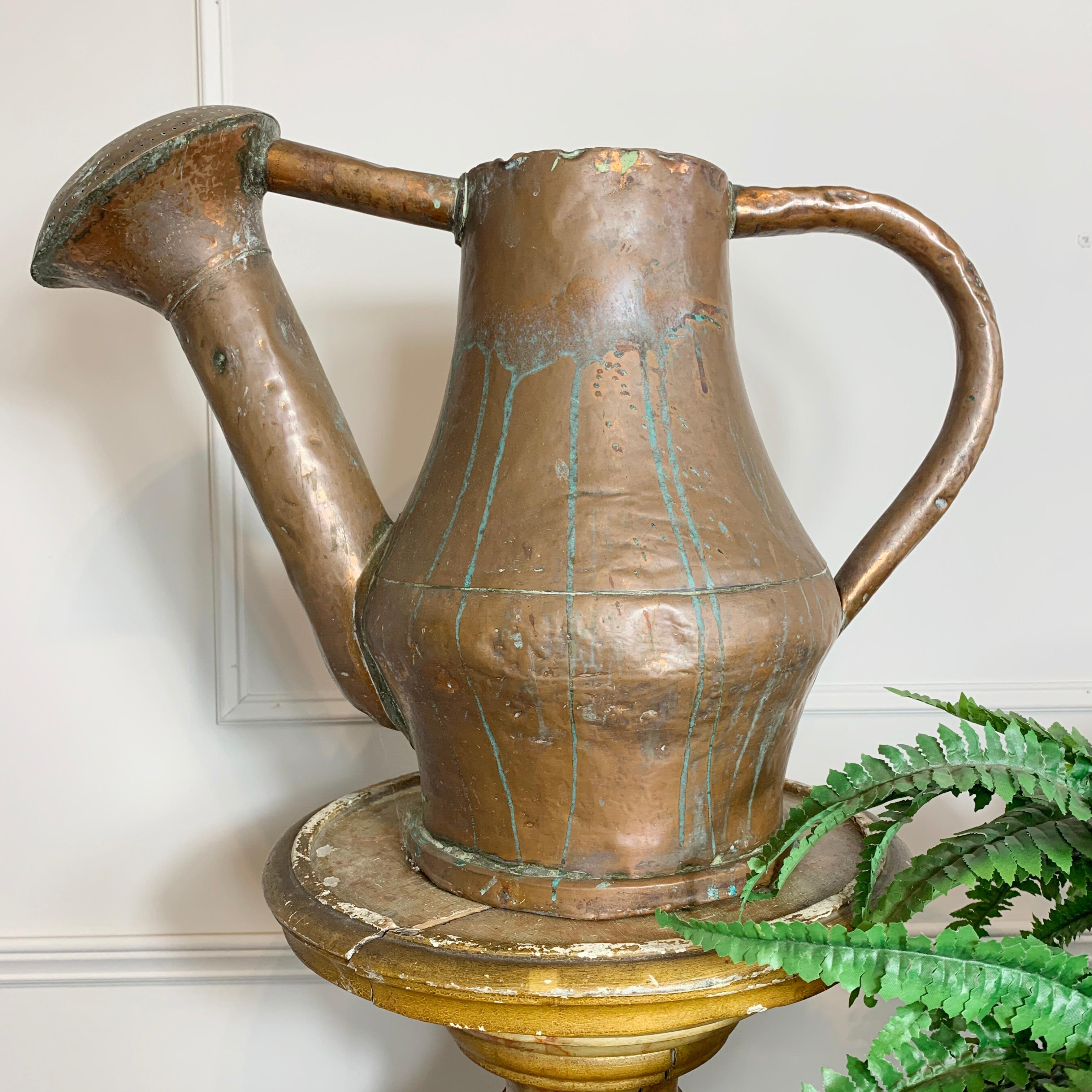 19th century French copper handcrafted watering can
Measures: 39cm height, 52cm width, 25cm depth
This can may have small leaks due to age, great for decorative use.
