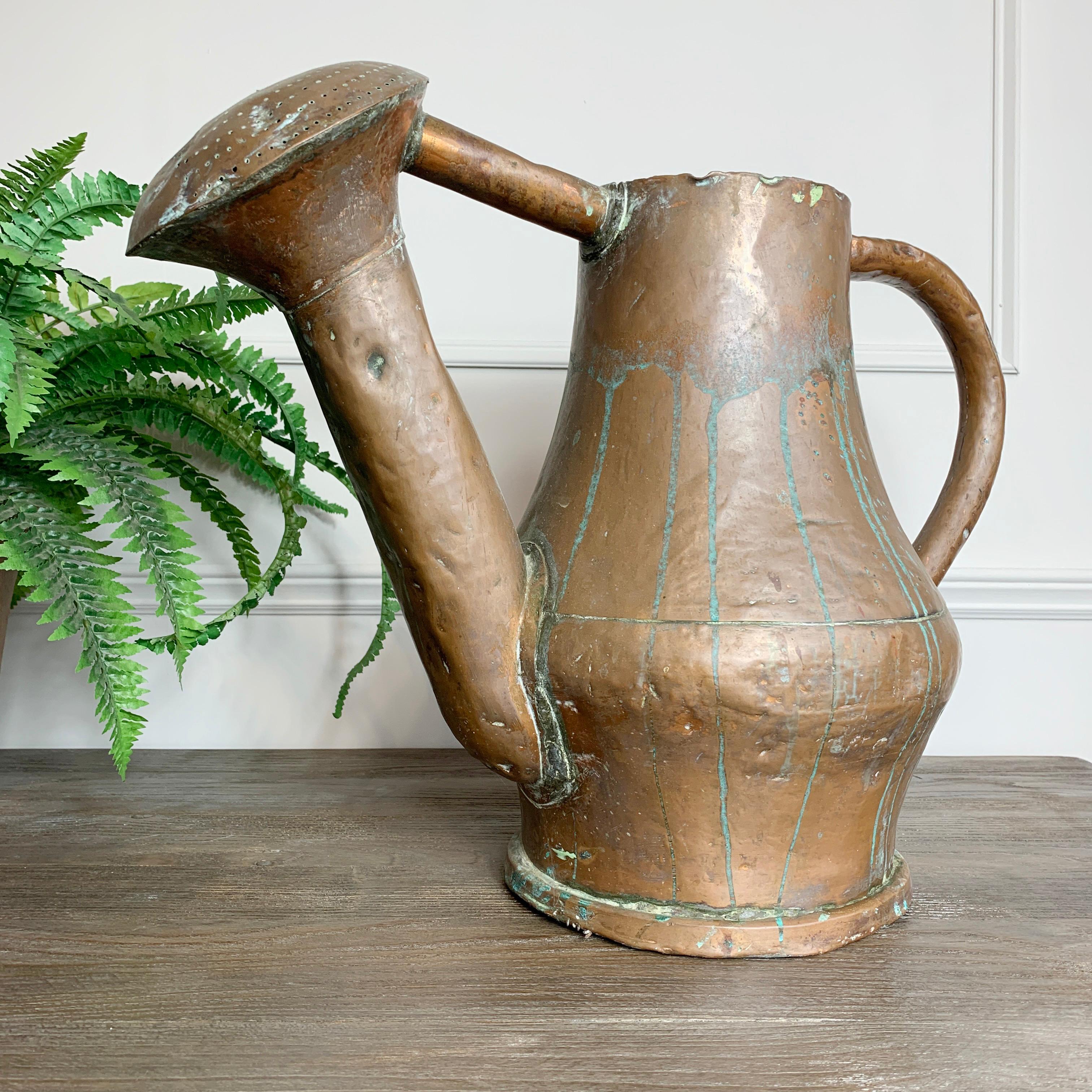 small brass watering can