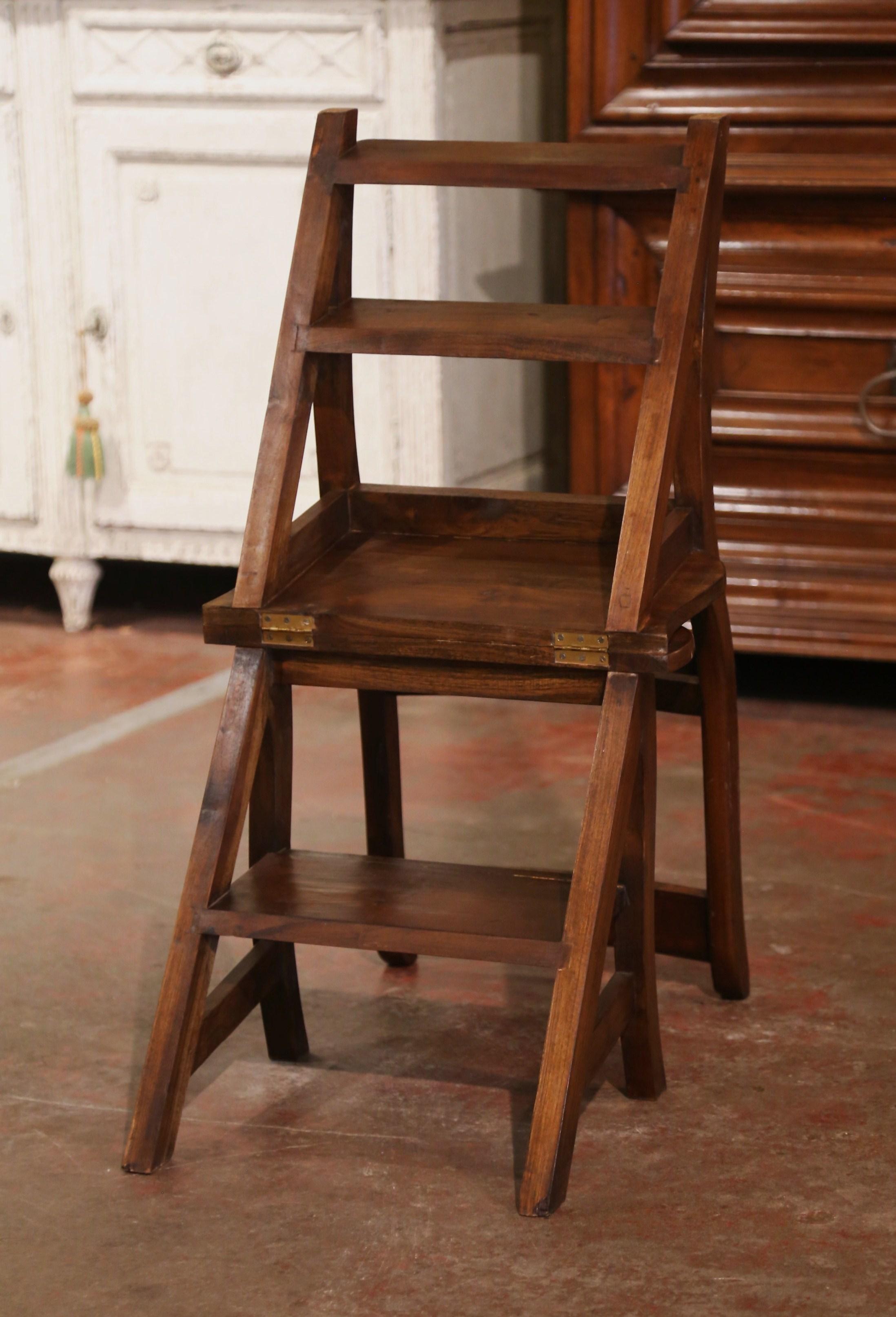 Decorate a library or study with this artisan-made folding step ladder chair. Crafted in Southern France circa 1890, the antique metamorphic chair features four carved ladders in the back; the double-function piece is hinged so that it can convert