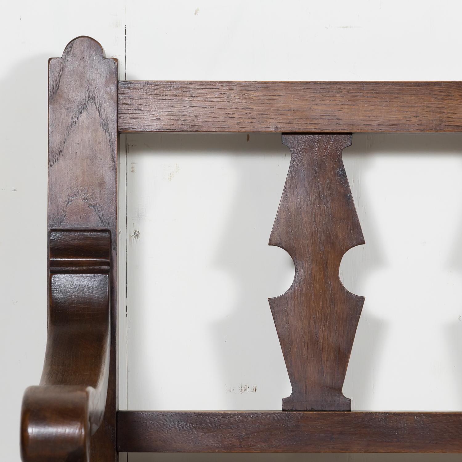 Late 19th Century 19th Century French Country Carved Oak Radassier or Hall Bench with Rush Seat