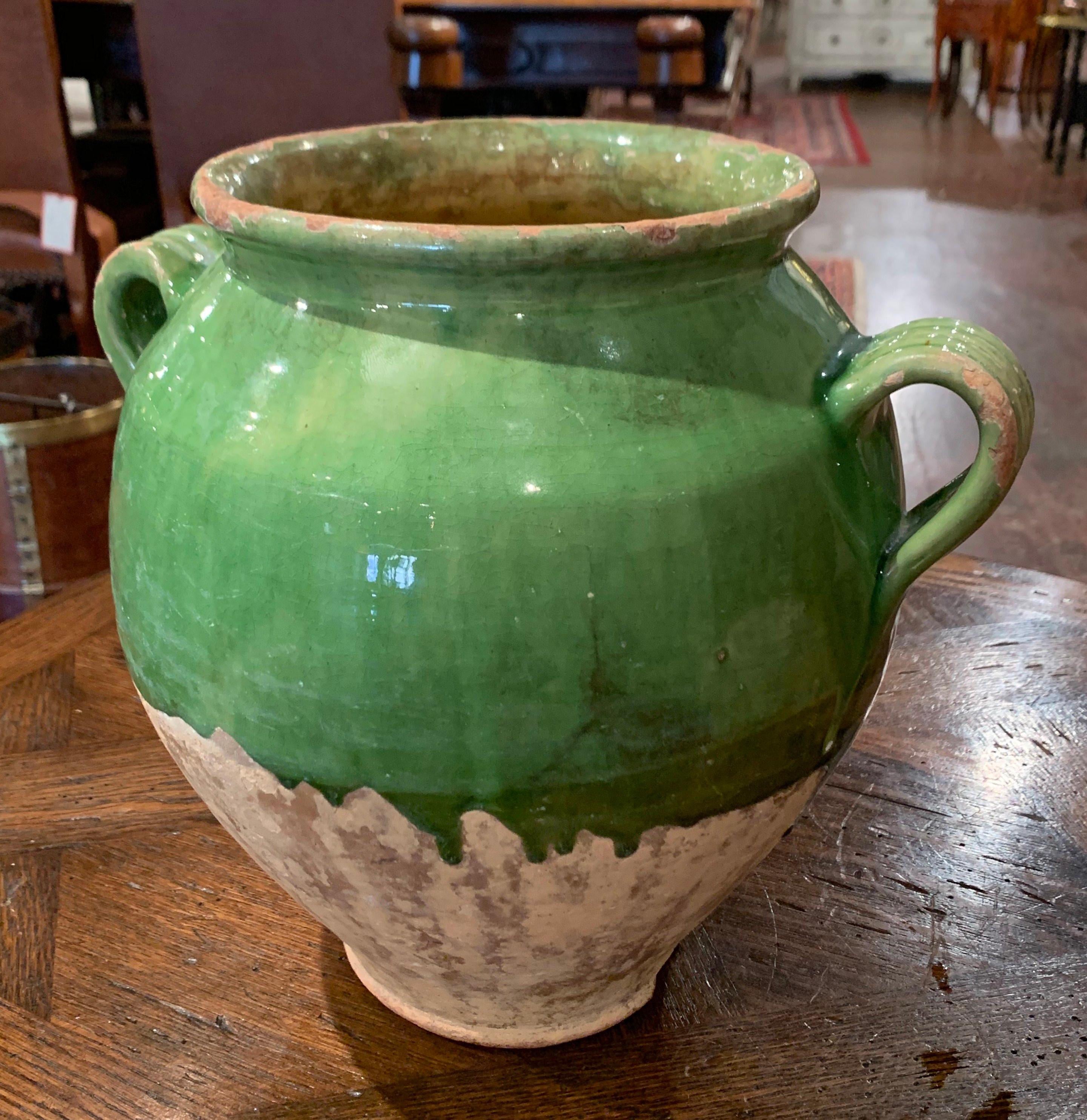Hard to find with green glazing, this colorful French confit pot with a glaze upper portion was created in the Perigord region of France, circa 1870. Made of earthenware, these traditional vessels were once used daily in the French country home for