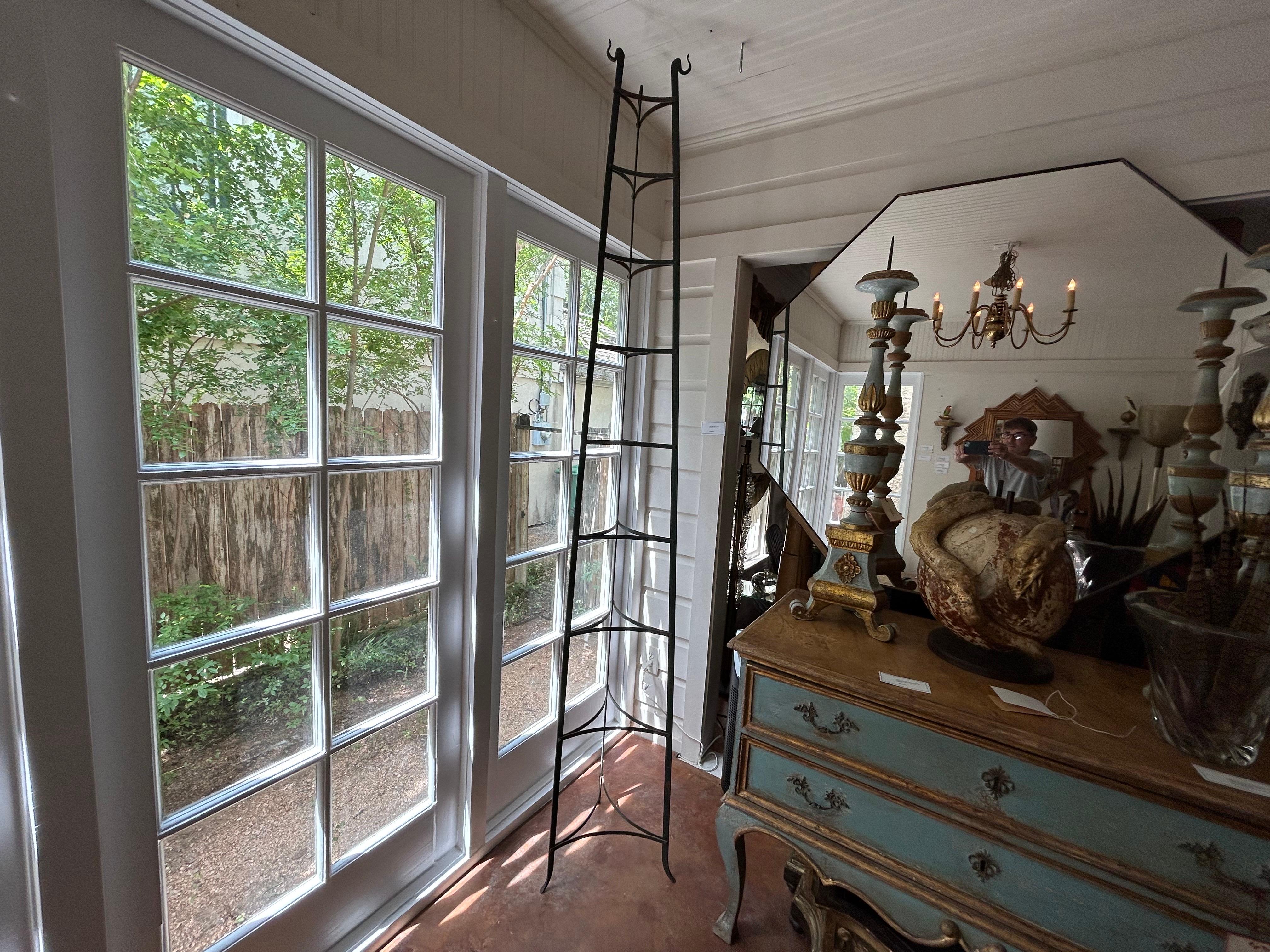 19th Century French Country Iron Pot Stand Or Rack.
This lovely French Country or French Provincial triangular hand forged wrought iron standing pot stand, pot rack or plate stand was a fixture in 19th century country kitchens.
Featuring graduating